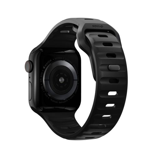 Apple Watch negra con correa robusta, vista posterior.
