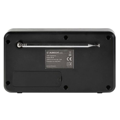Achterkant van een zwarte radio met uitschuifbare antenne en label.