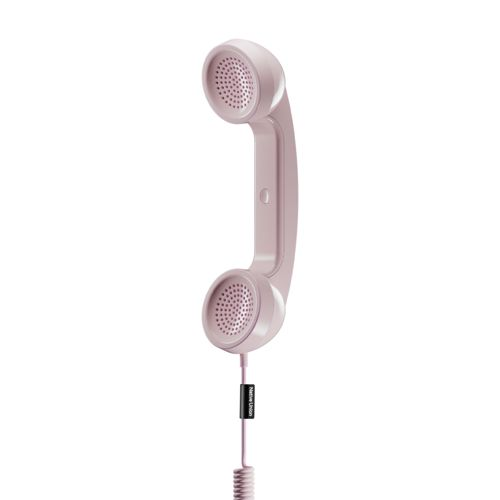 Un auricolare telefonico retrò rosa con cavo a spirale ed etichetta nera.