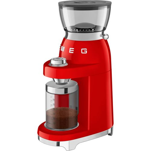 Molinillo de café rojo con recipiente transparente y café molido.