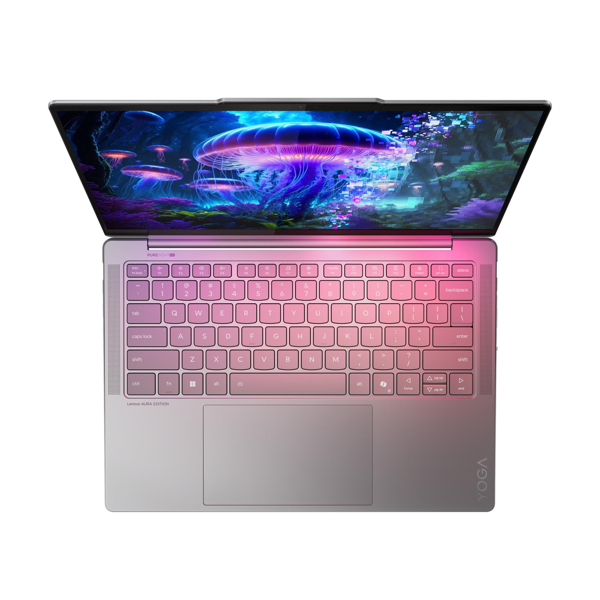 Un laptop aperto che mostra uno sfondo desktop di meduse luminose.