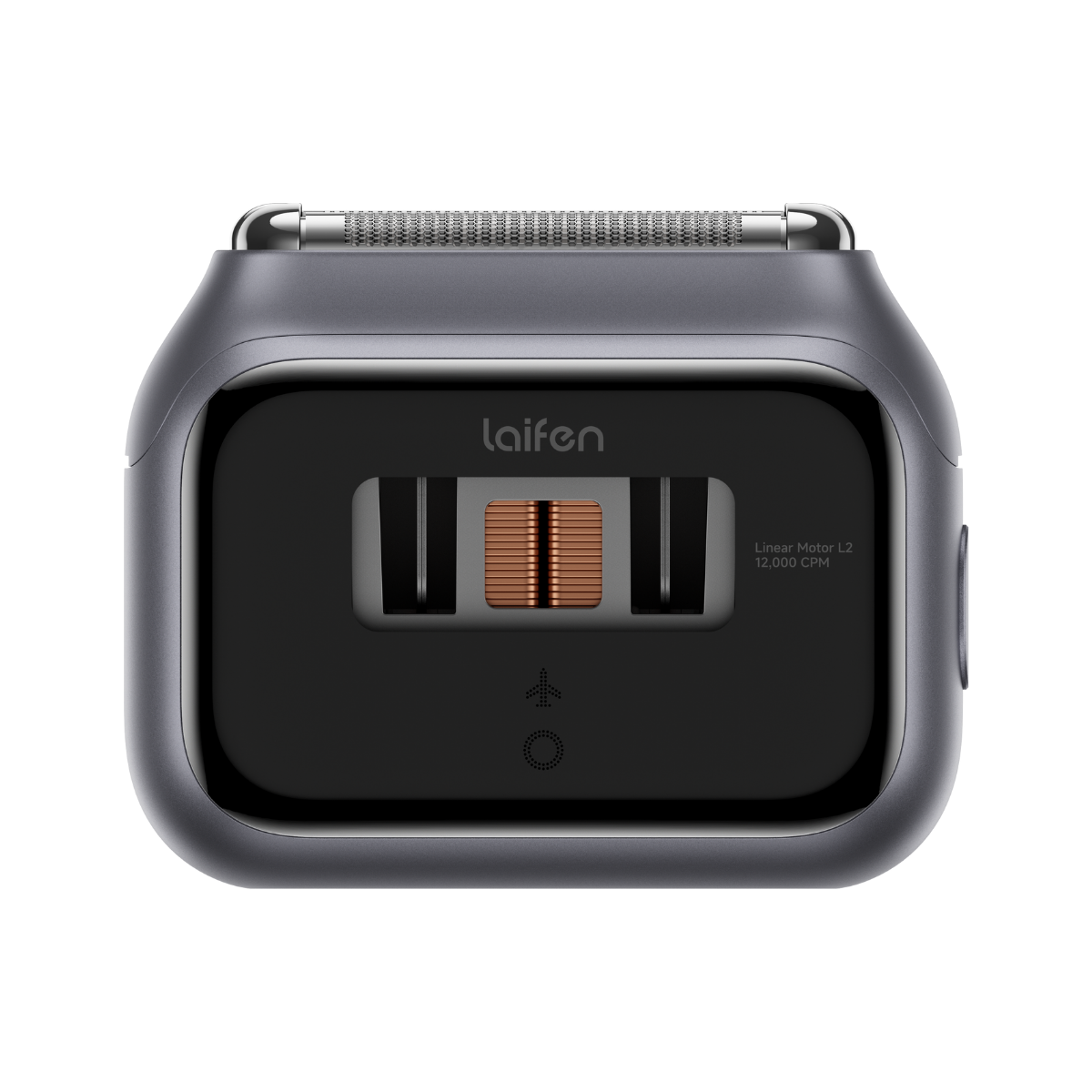 Rasoir électrique gris foncé avec grille argentée et moteur en cuivre visible.