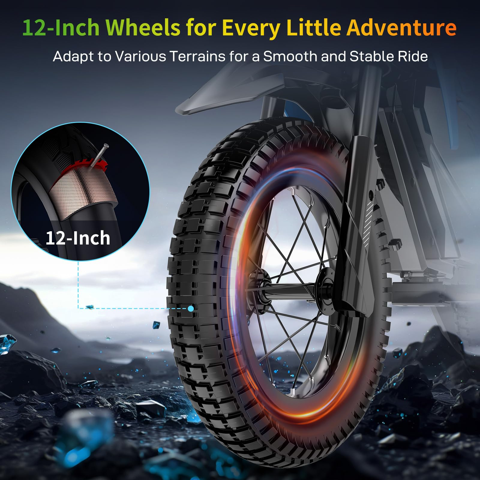 Close-up of a 12-inch bike tire with chunky treads on rocky terrain.