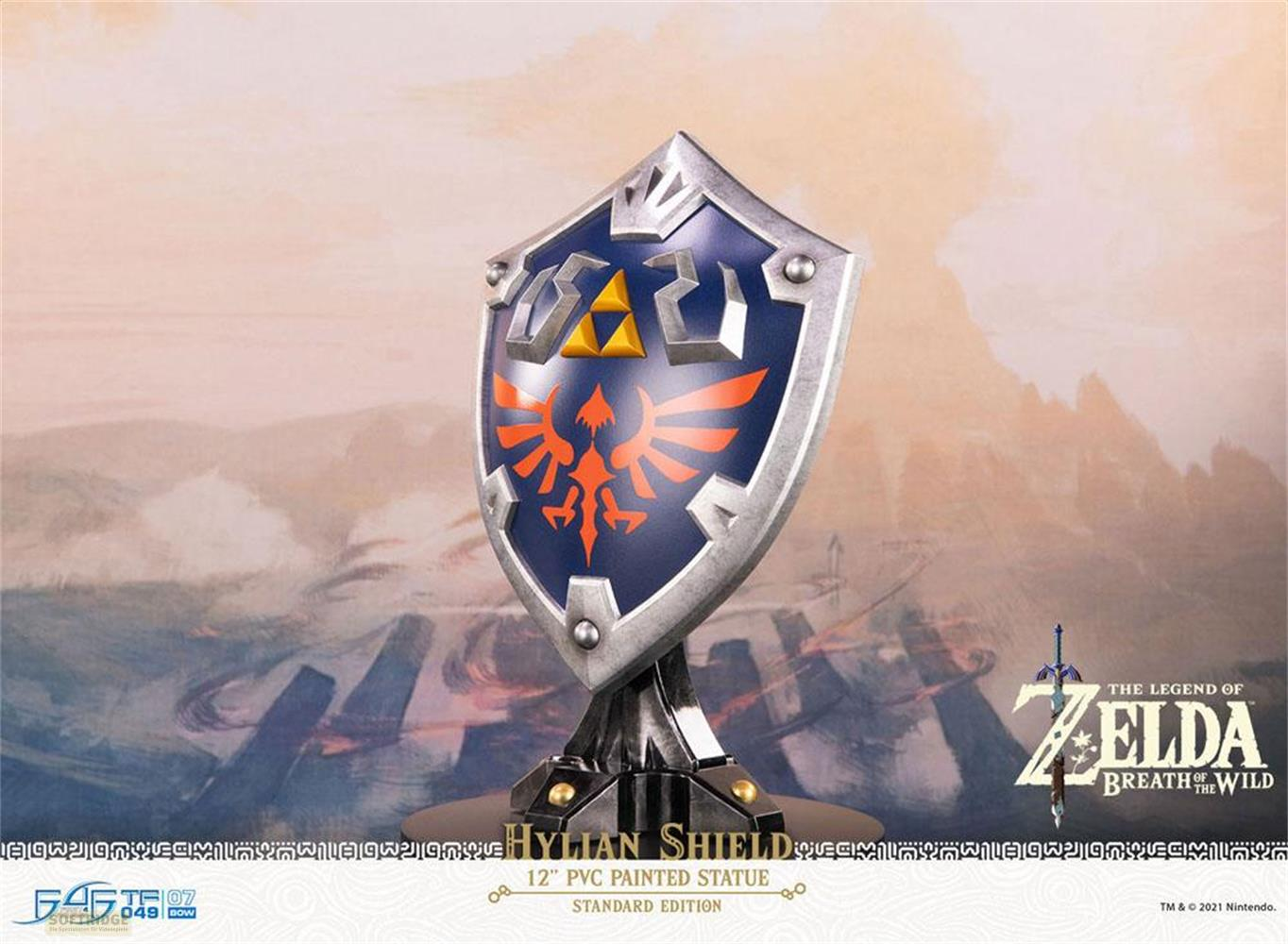 Ein Hylian-Schild-Statuenmodell mit dem Zelda-Logo im Hintergrund.