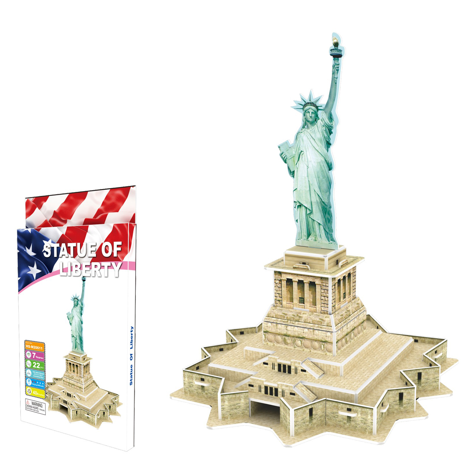 Un puzzle 3D della Statua della Libertà e la sua confezione con bandiera americana.