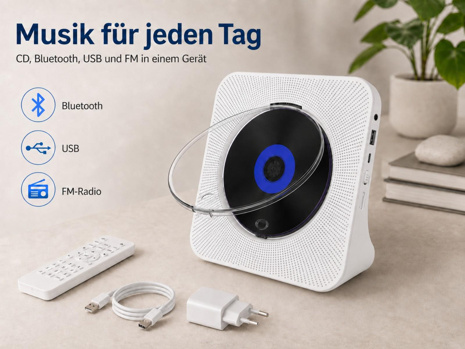 Ein weißer CD-Player mit Fernbedienung, USB-Kabel und Netzteil.
