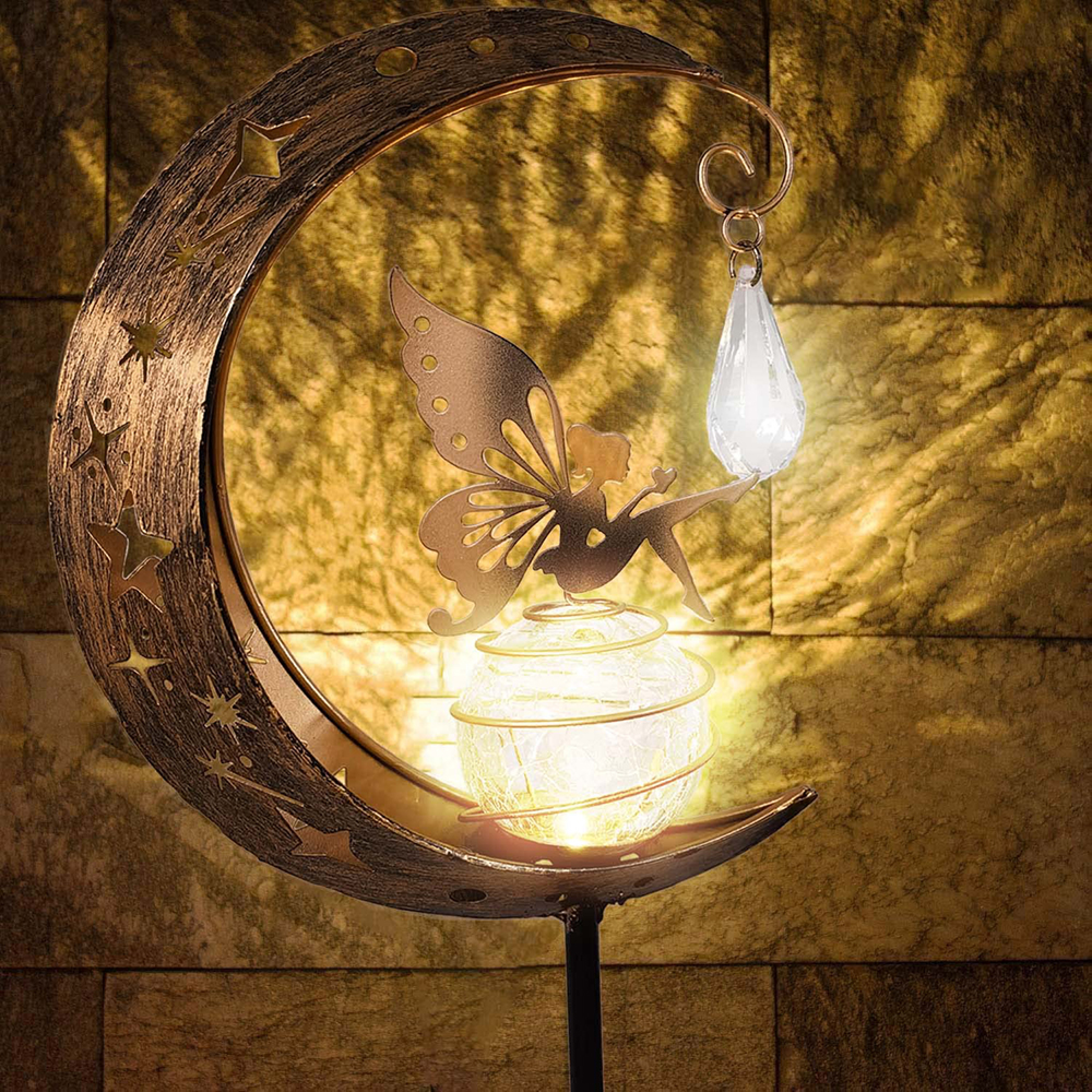 Mondlampe mit Fee und Glaskugel, die im Dunkeln leuchten.