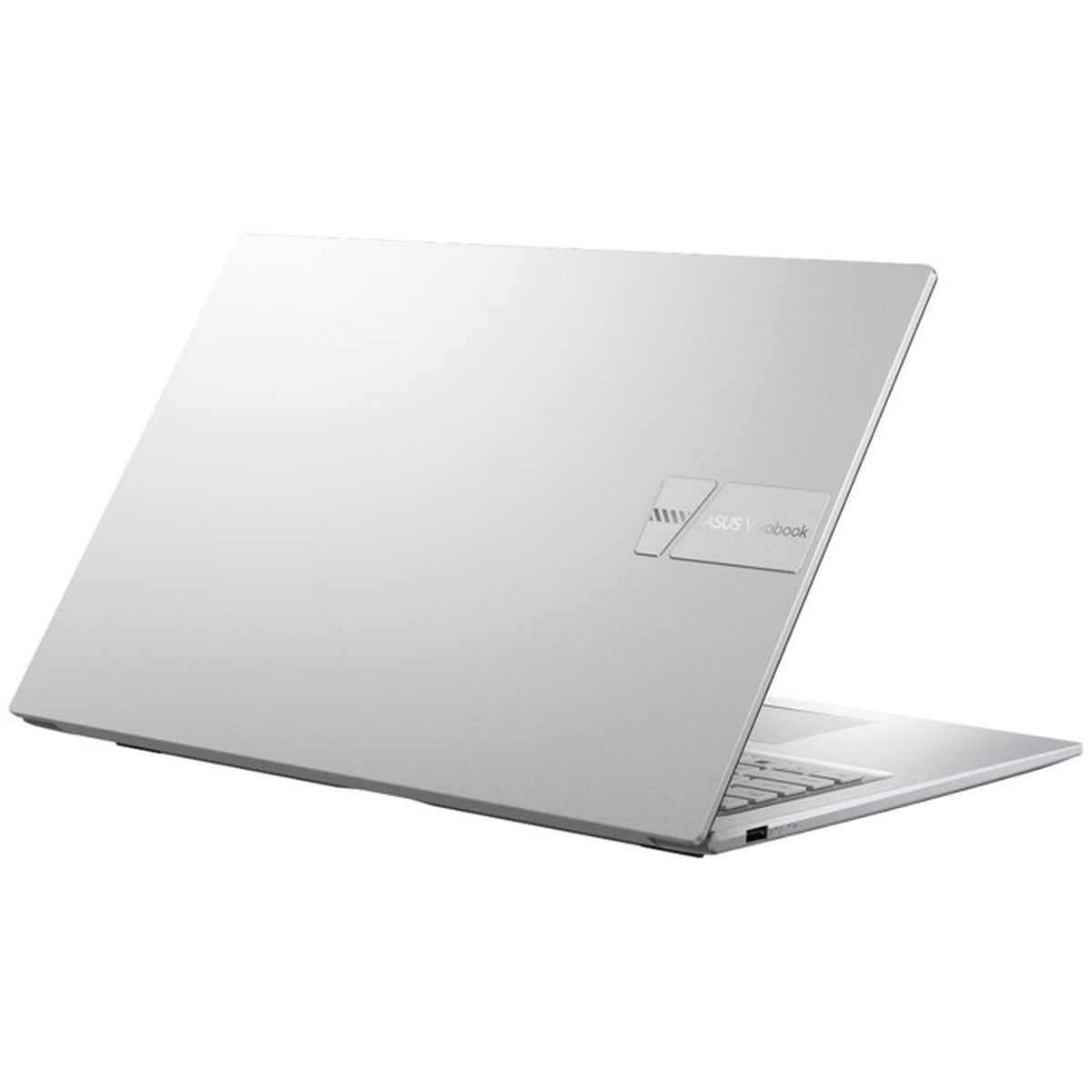 Un portátil Asus Vivobook plateado y cerrado, visto de lado.