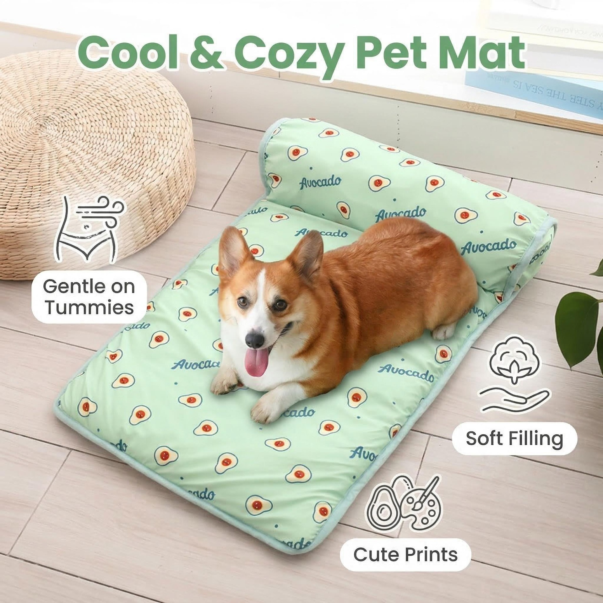 Ein Corgi liegt auf einer hellgrünen Decke mit Avocadodruck.