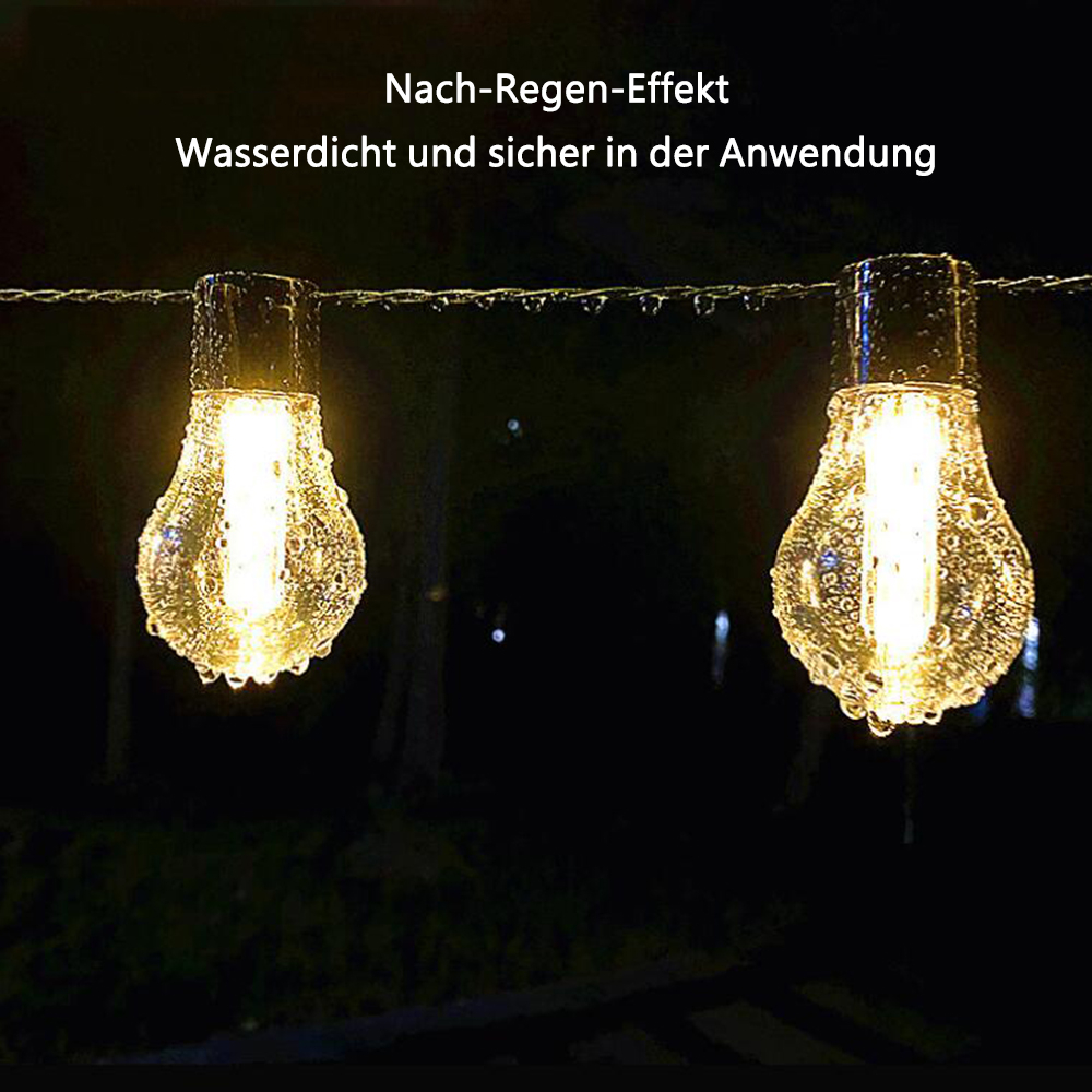 Zwei beleuchtete Glühbirnen mit Wassertropfen, die an einer Schnur hängen.