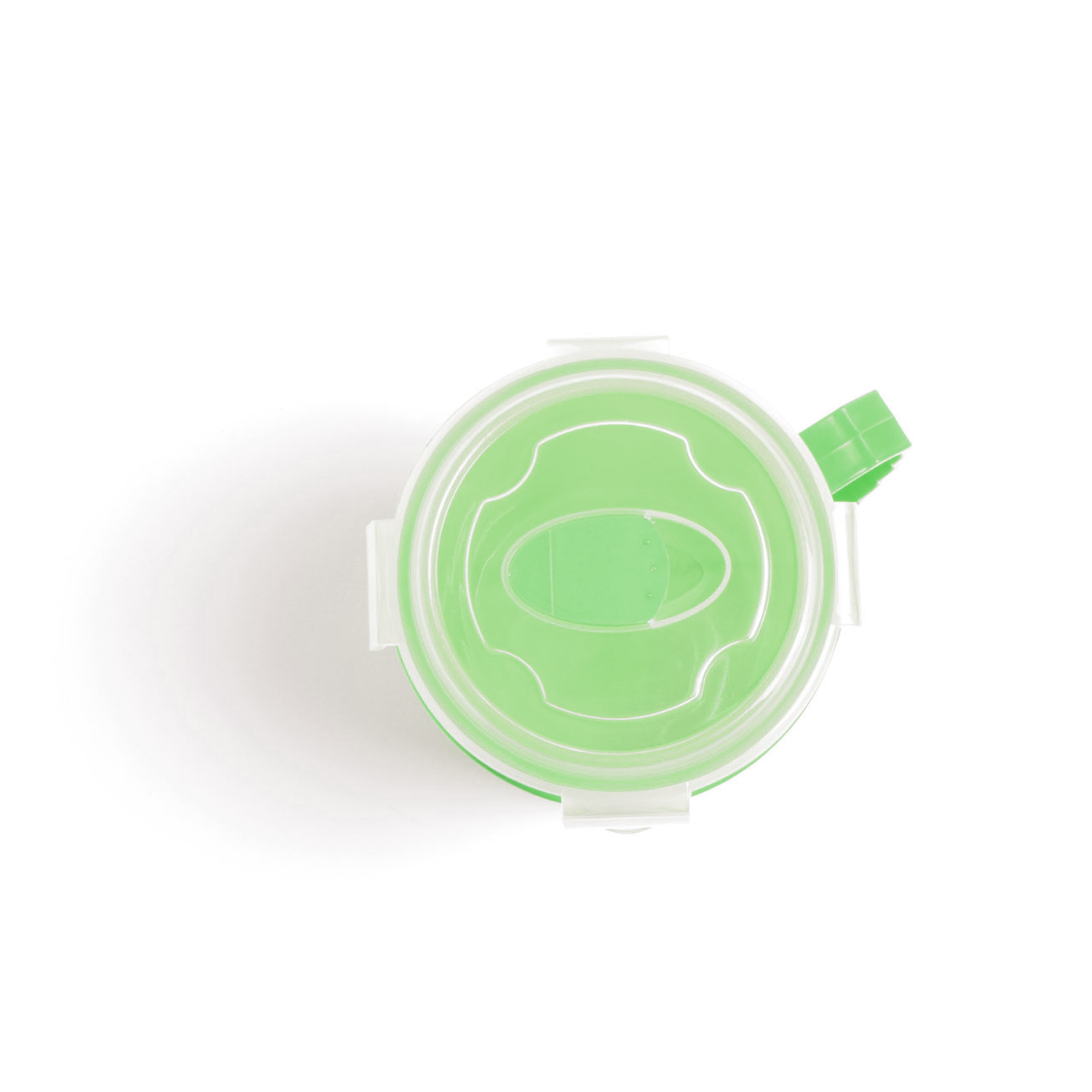 Un contenitore rotondo e verde con coperchio bianco e clip, visto dall'alto.