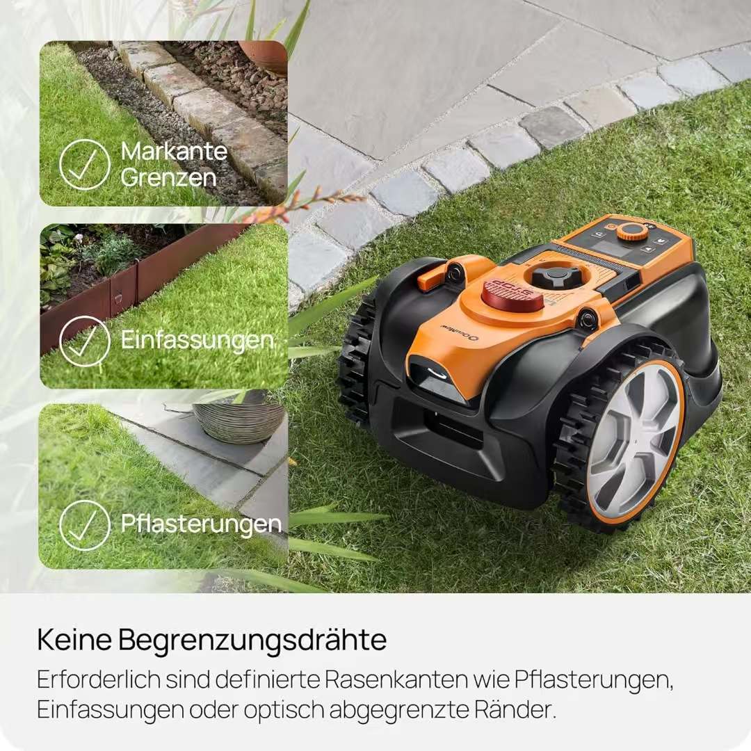 Ein Mähroboter steht auf einem Rasen neben gepflasterten Wegen und Beeteinfassungen.