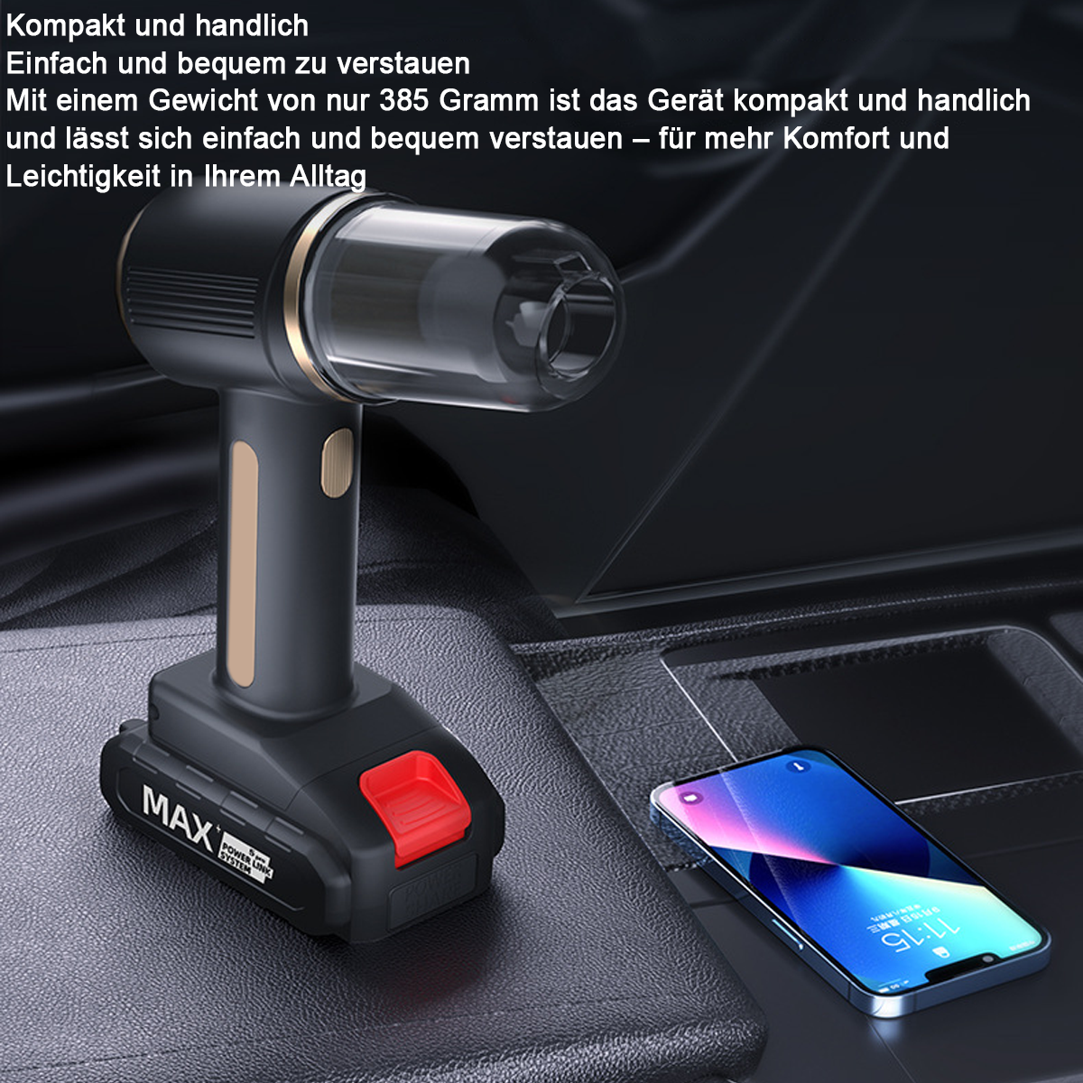 Ein schwarzer Handstaubsauger mit goldener Zierleiste und einem Smartphone.