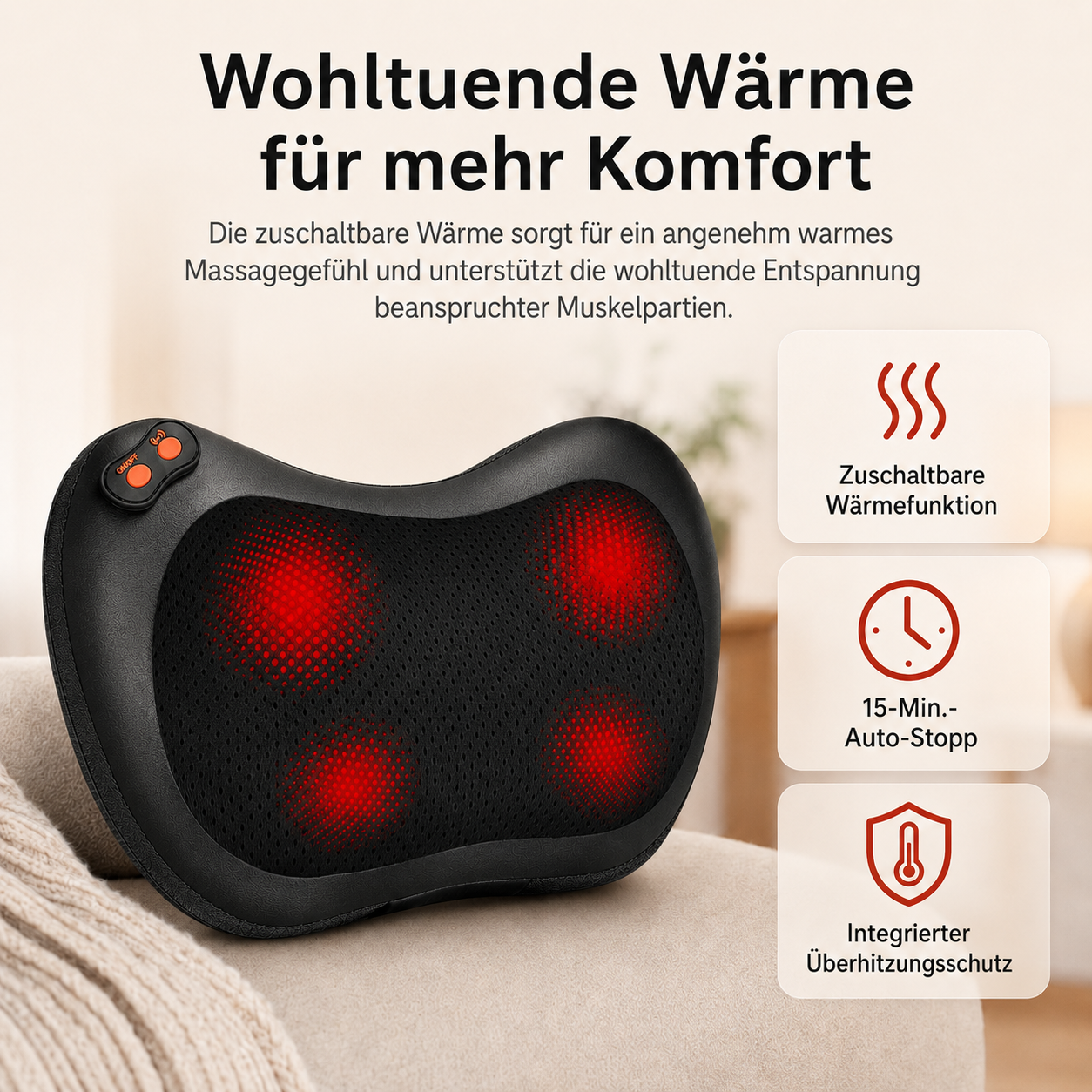 Schwarzes Massagekissen mit roten Heizelementen auf einem Sofa.