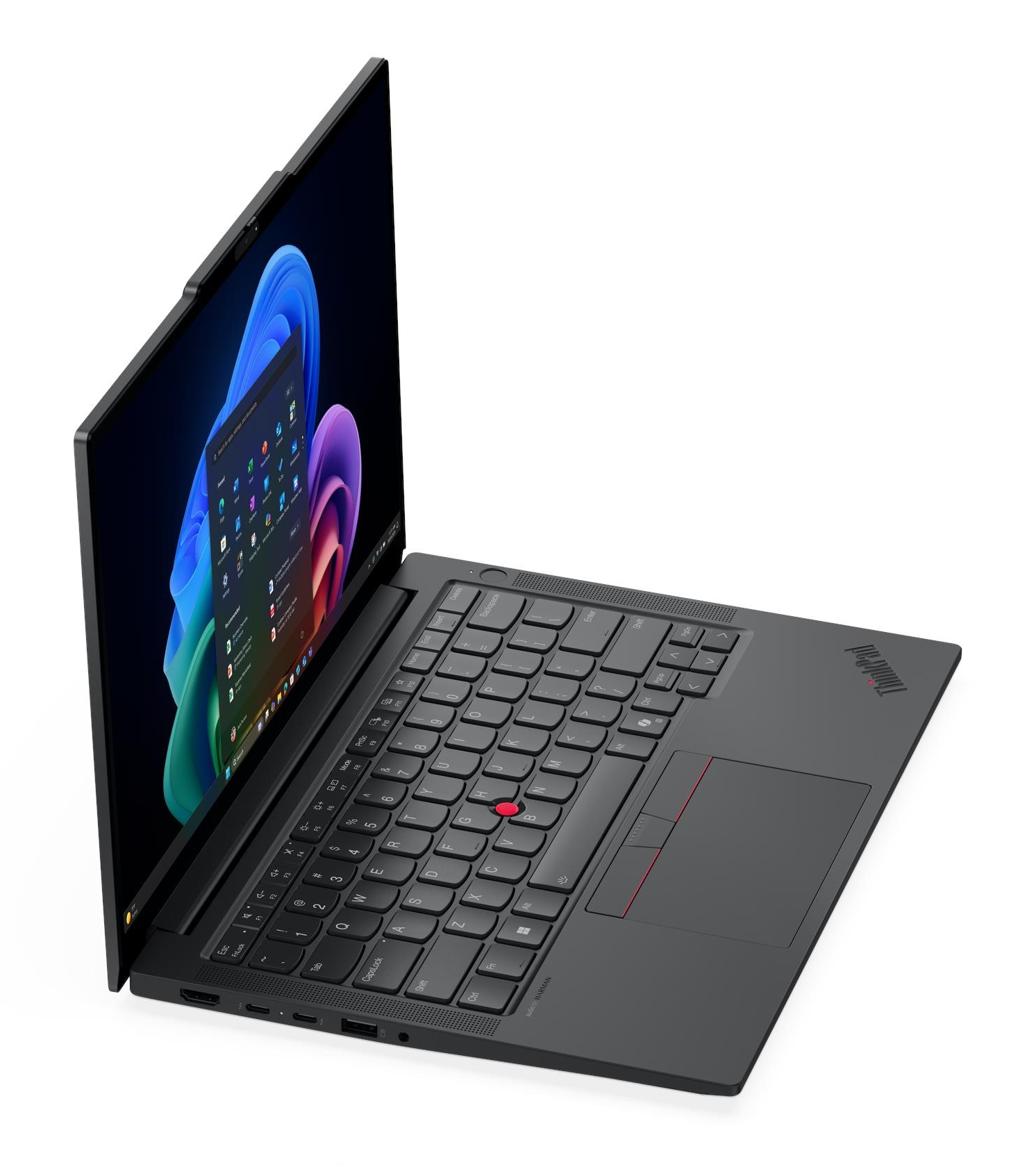Un laptop aperto e scuro con schermo illuminato che mostra uno sfondo colorato.