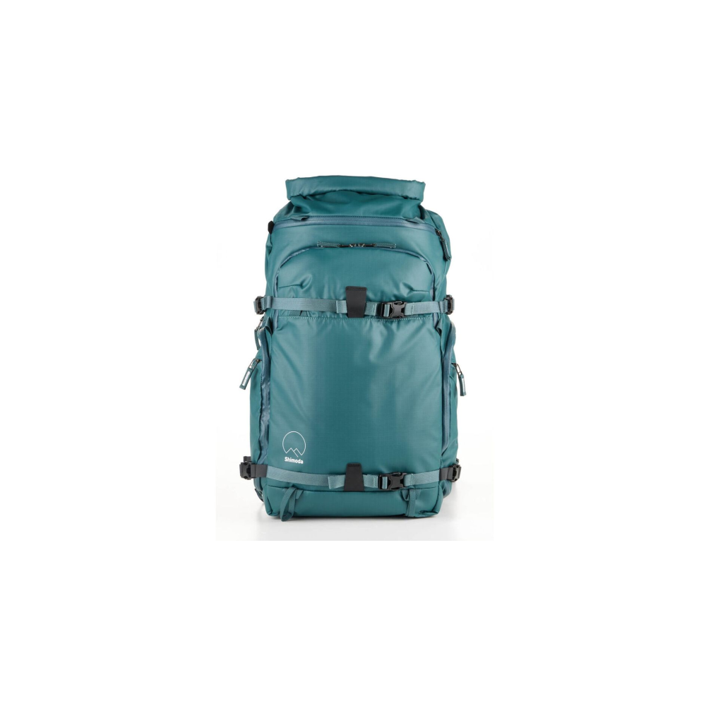Turquoise rugzak met banden en gespen op witte achtergrond. Rolsluiting.