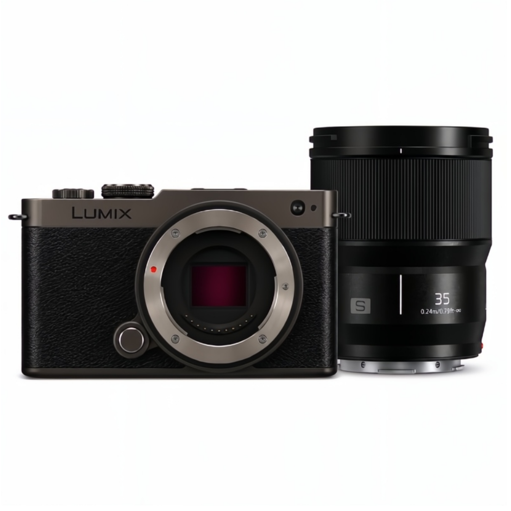 Zilverkleurige en zwarte digitale camera met lens.