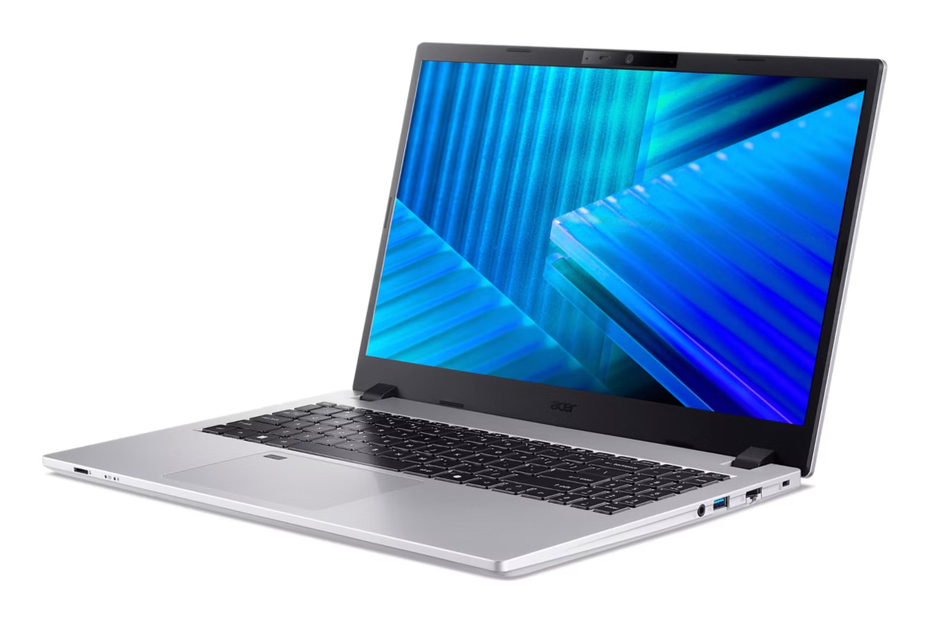 Srebrny laptop z niebieskim abstrakcyjnym tłem na ekranie.