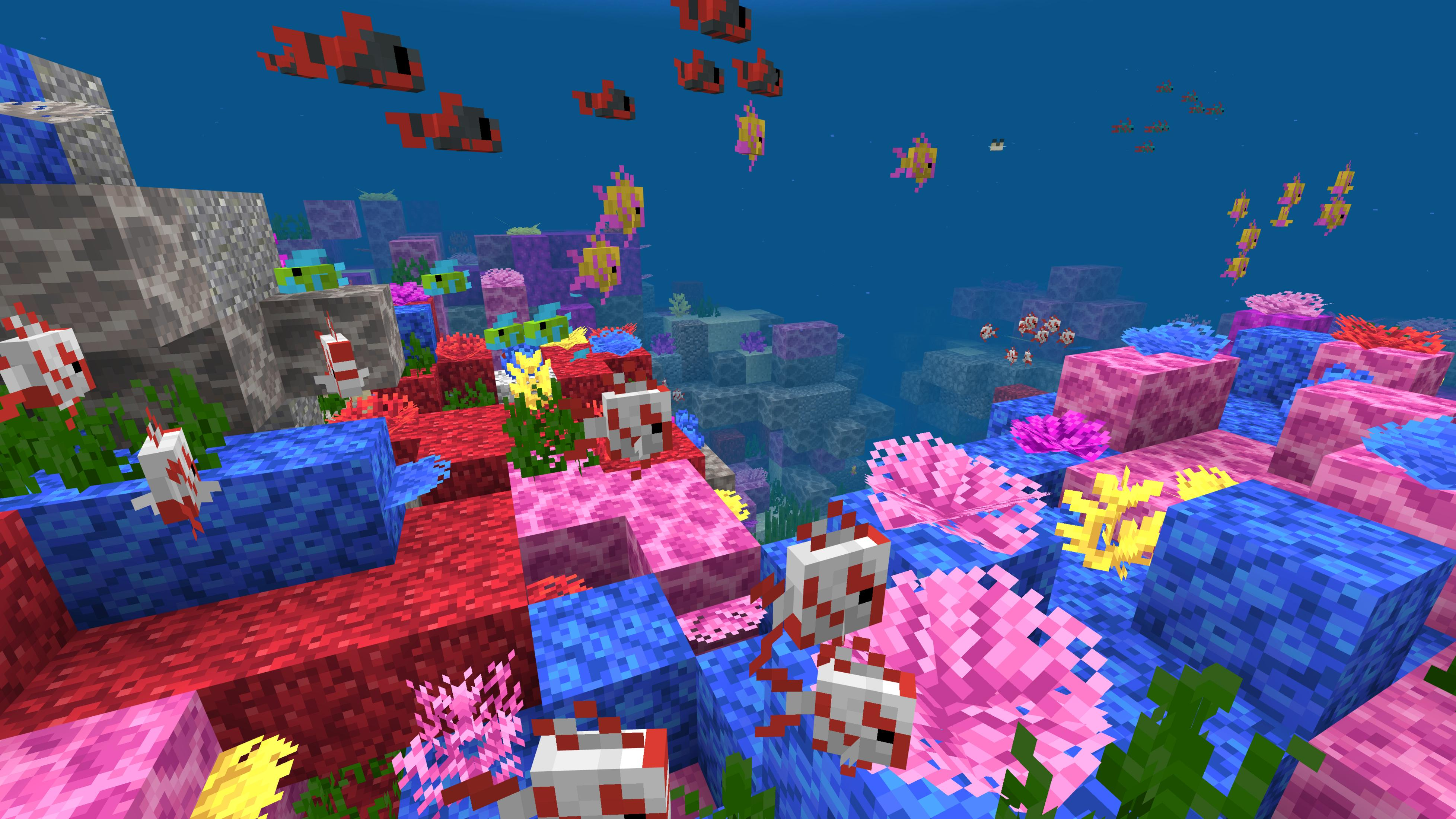 Minecraft onderwater scène met kleurrijk koraal, rotsen en diverse vissen.