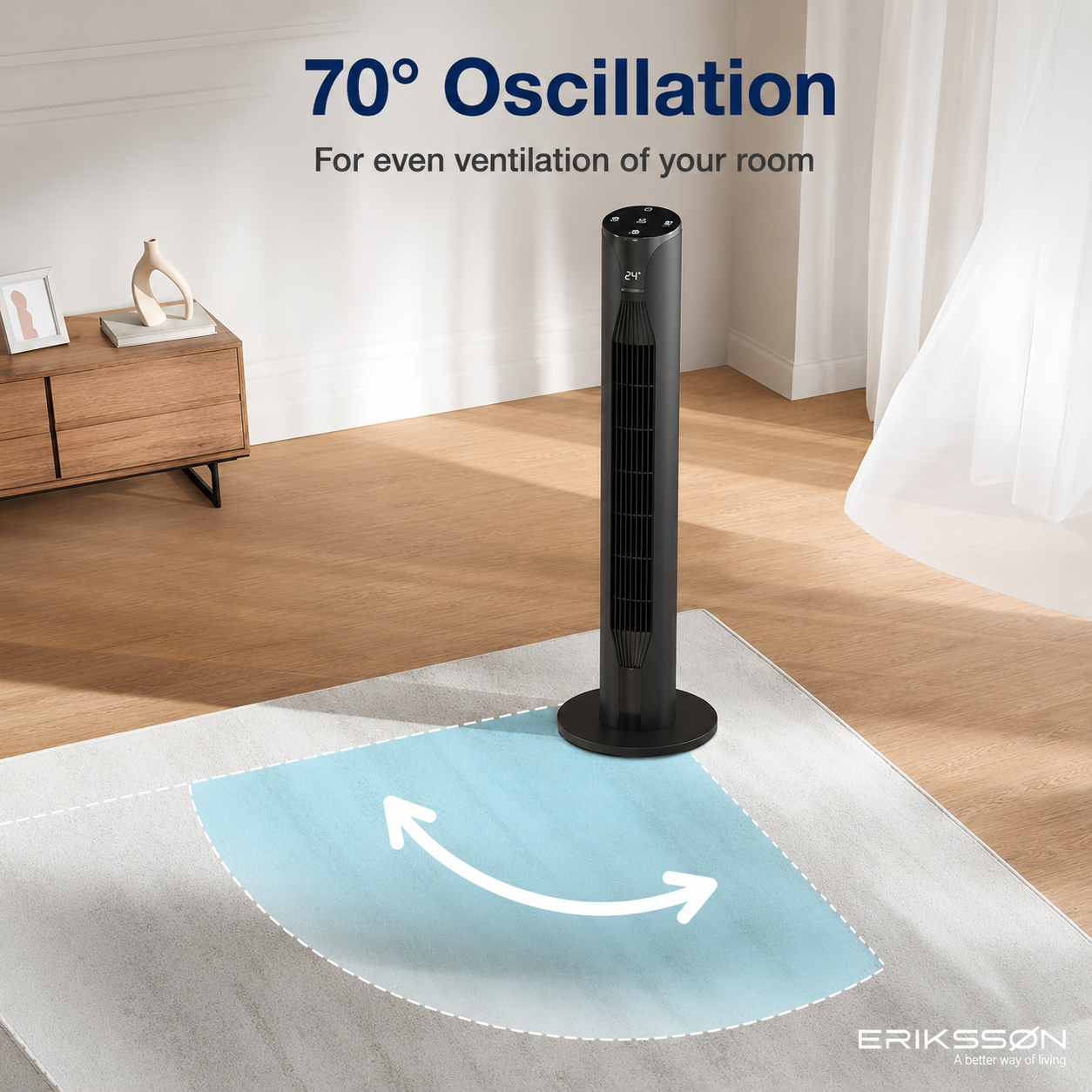 Ventilador de torre negro oscilando 70 grados en una habitación con suelo de madera y alfombra.