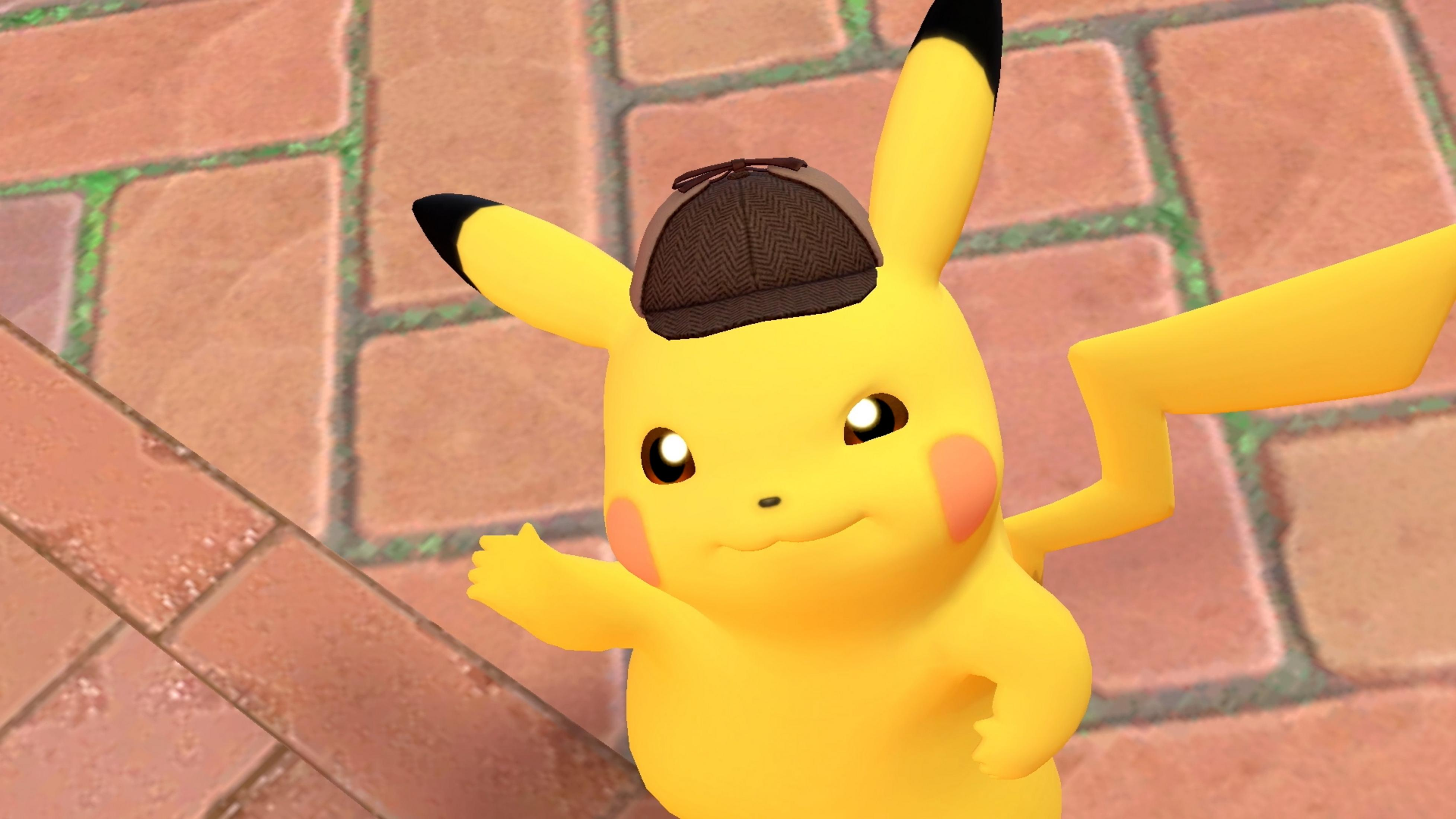 Een gele Pikachu met hoed zwaait met zijn linkerhand. Bakstenen achtergrond.