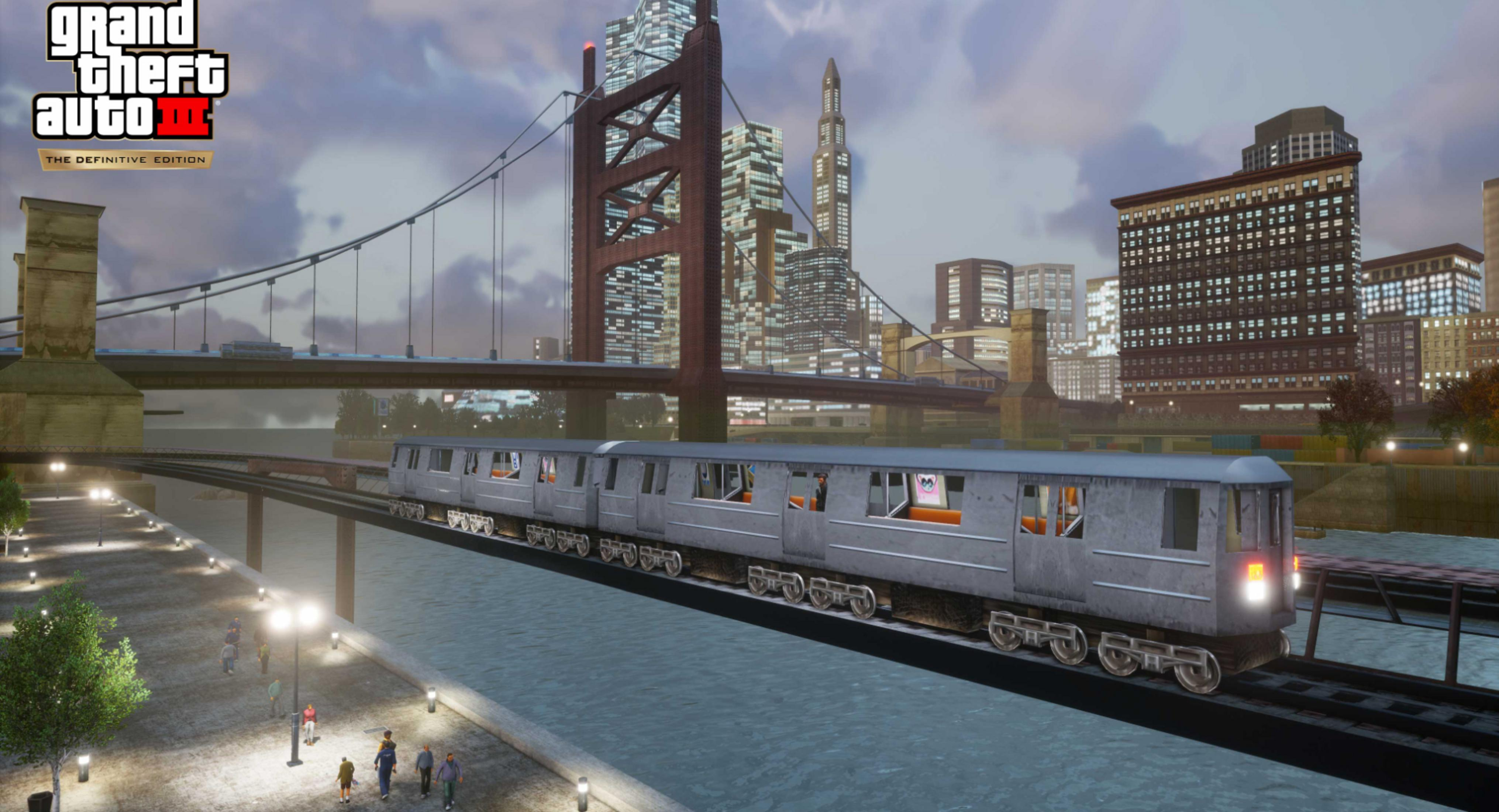 A subway train travels over a bridge with a city skyline in the background.