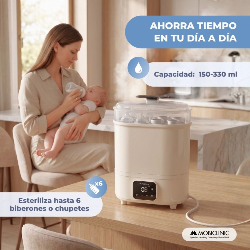 Una mujer alimenta a un bebé. Un esterilizador a vapor está al lado.
