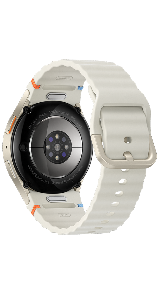 Back view of a cream-colored smartwatch with silver and orange accents and sensors.