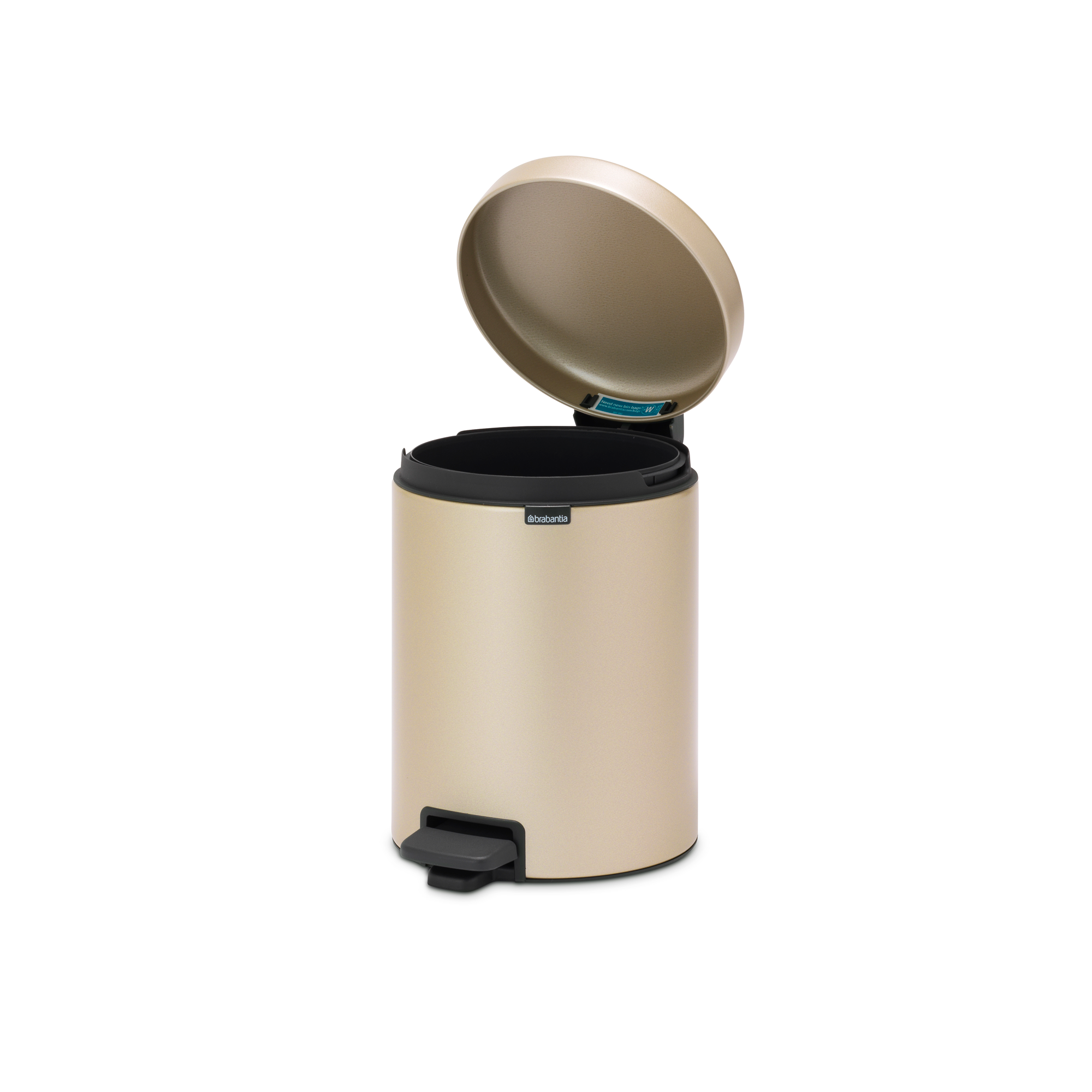 Beige pedaalemmer met open deksel en zwart pedaal.