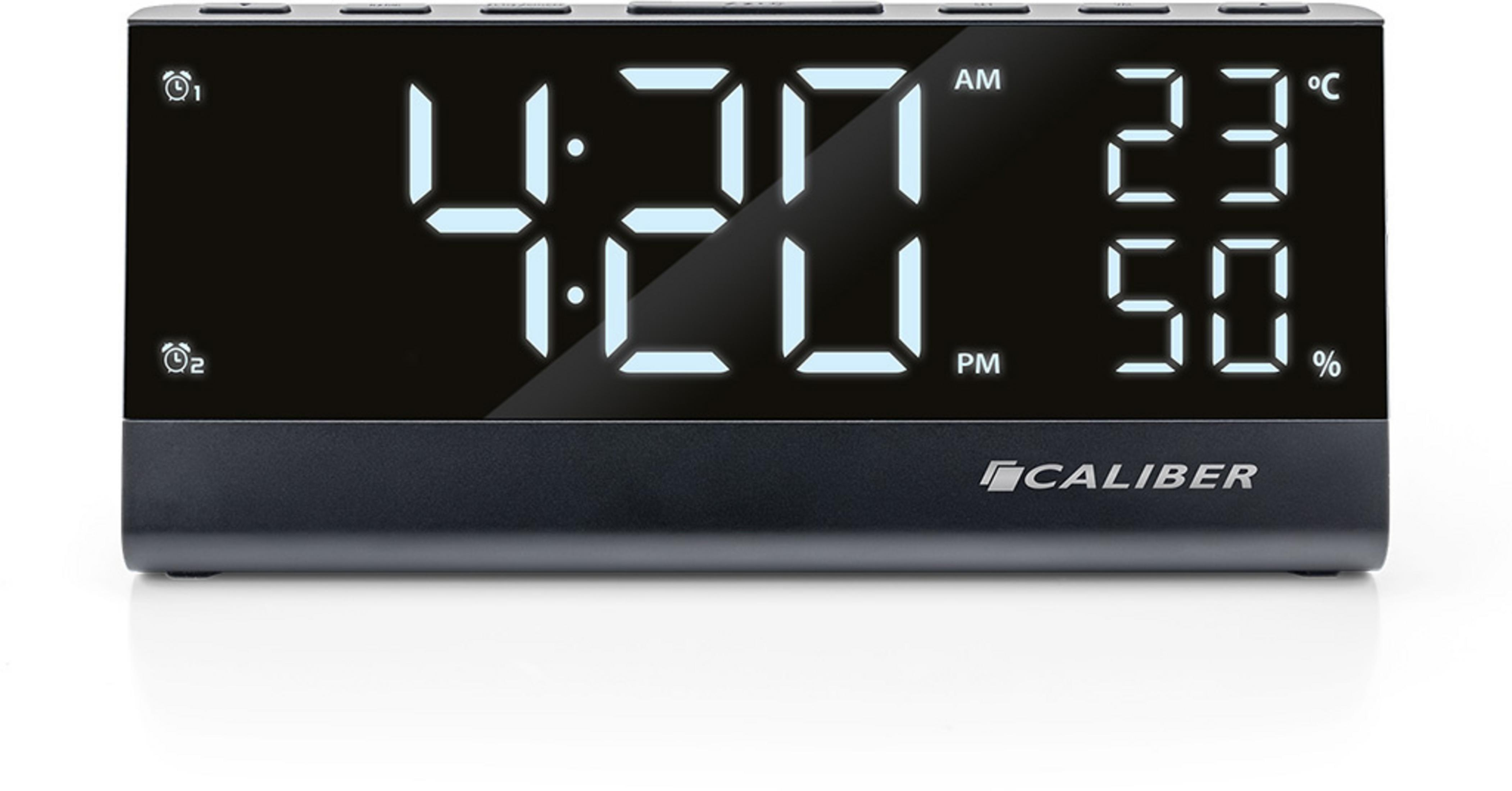 Digitaluhr zeigt 4:21 AM, 23°C und 50% Luftfeuchtigkeit.