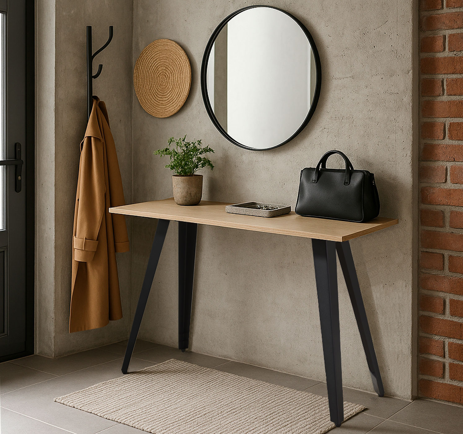 Una mesa estrecha de madera con patas negras, un abrigo, un bolso y un espejo.