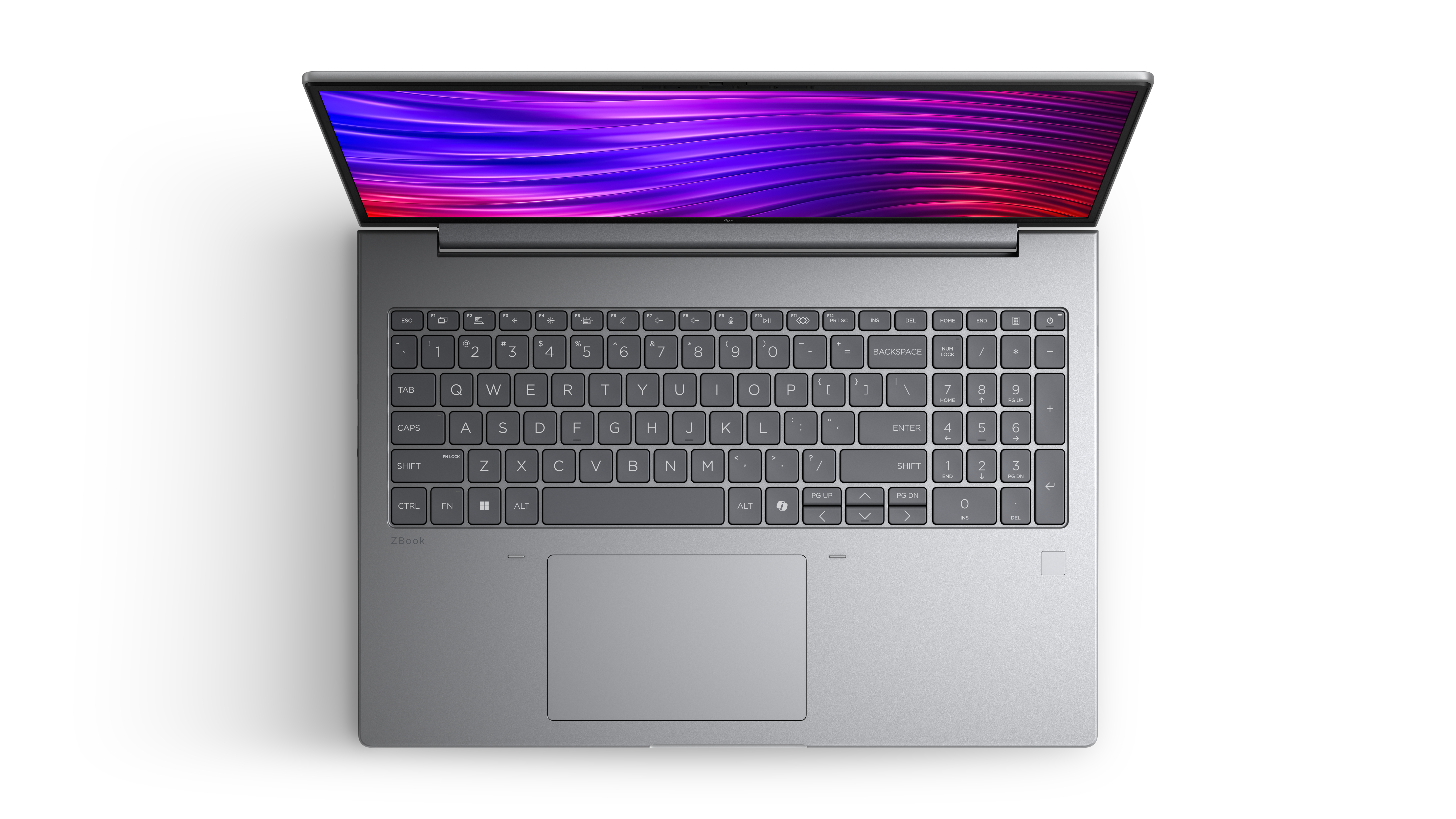 Un laptop argentato aperto con uno sfondo colorato sullo schermo.