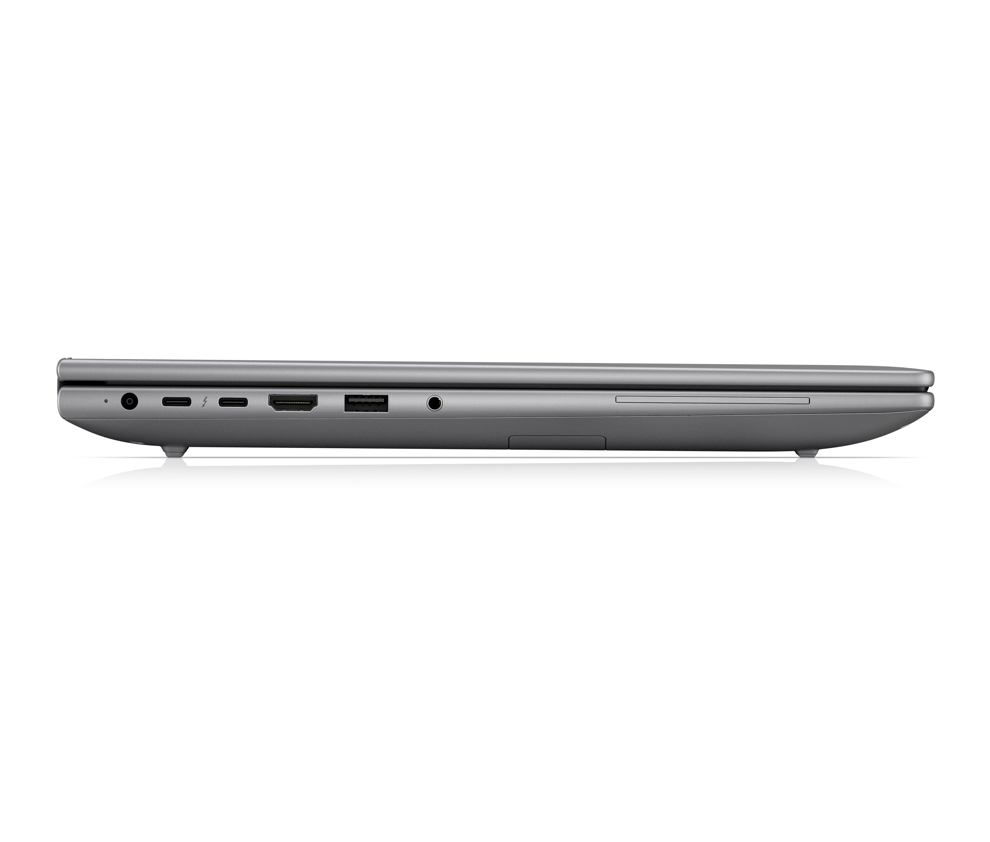 Vista laterale di un laptop grigio che mostra le porte: USB-C, HDMI, jack per cuffie.