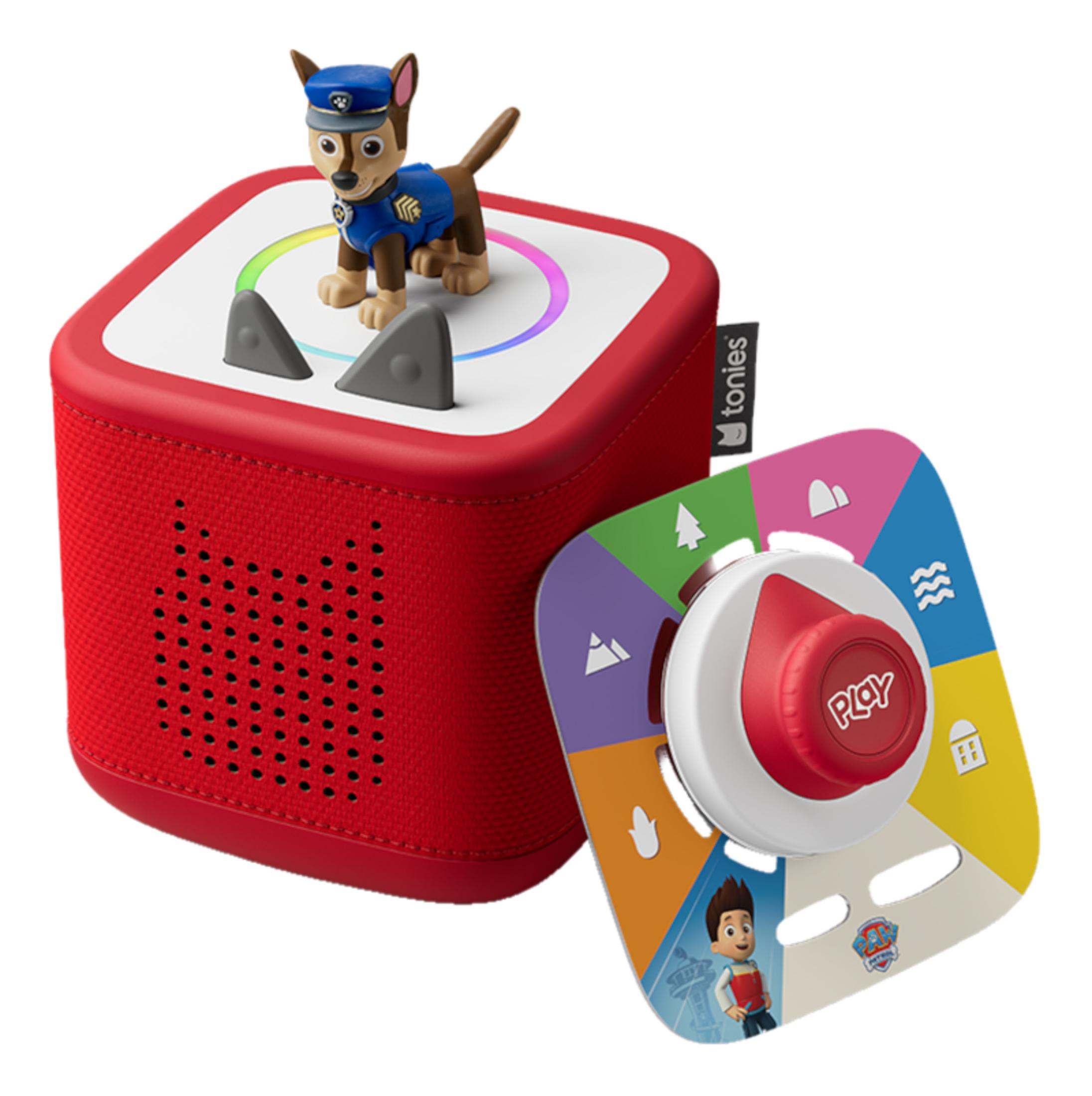 Un haut-parleur rouge Toniebox avec Chase de Paw Patrol et une tablette de commande colorée.