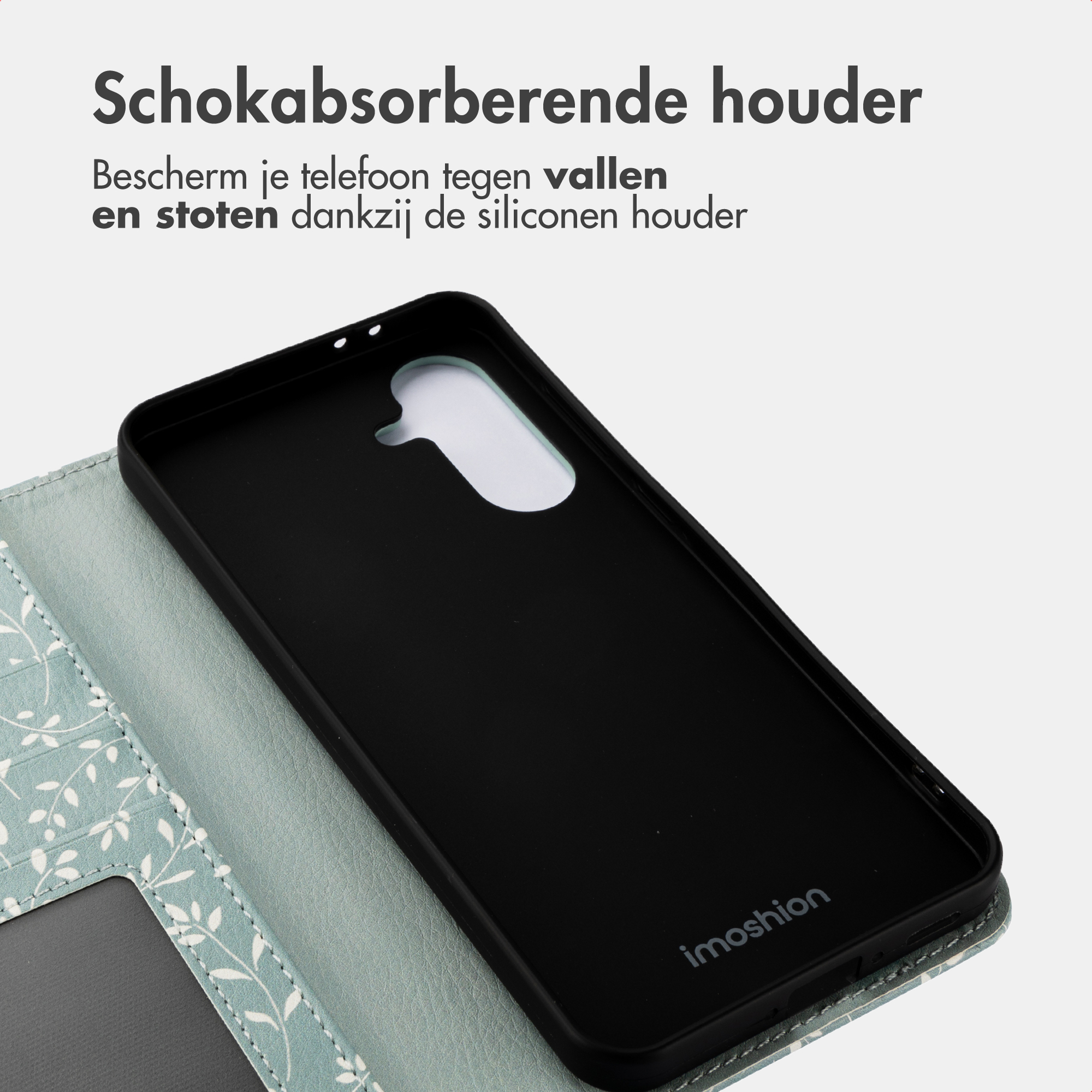 Coque de téléphone noire avec un rabat à motifs à côté.