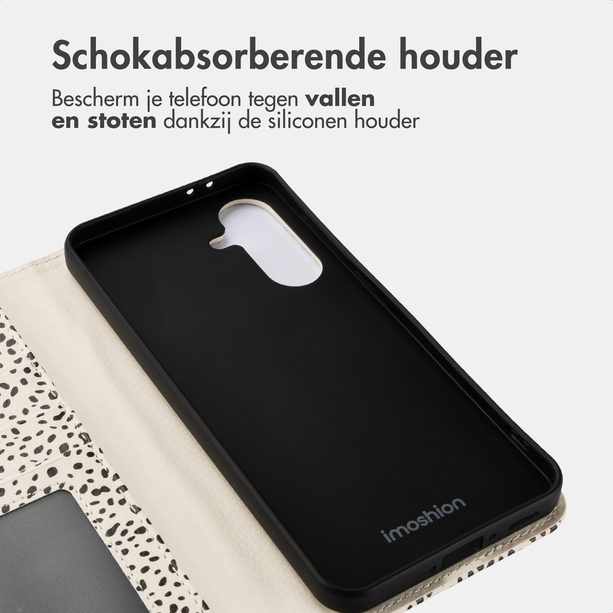 Intérieur de coque de téléphone en silicone noir avec couverture à pois dalmatiens.