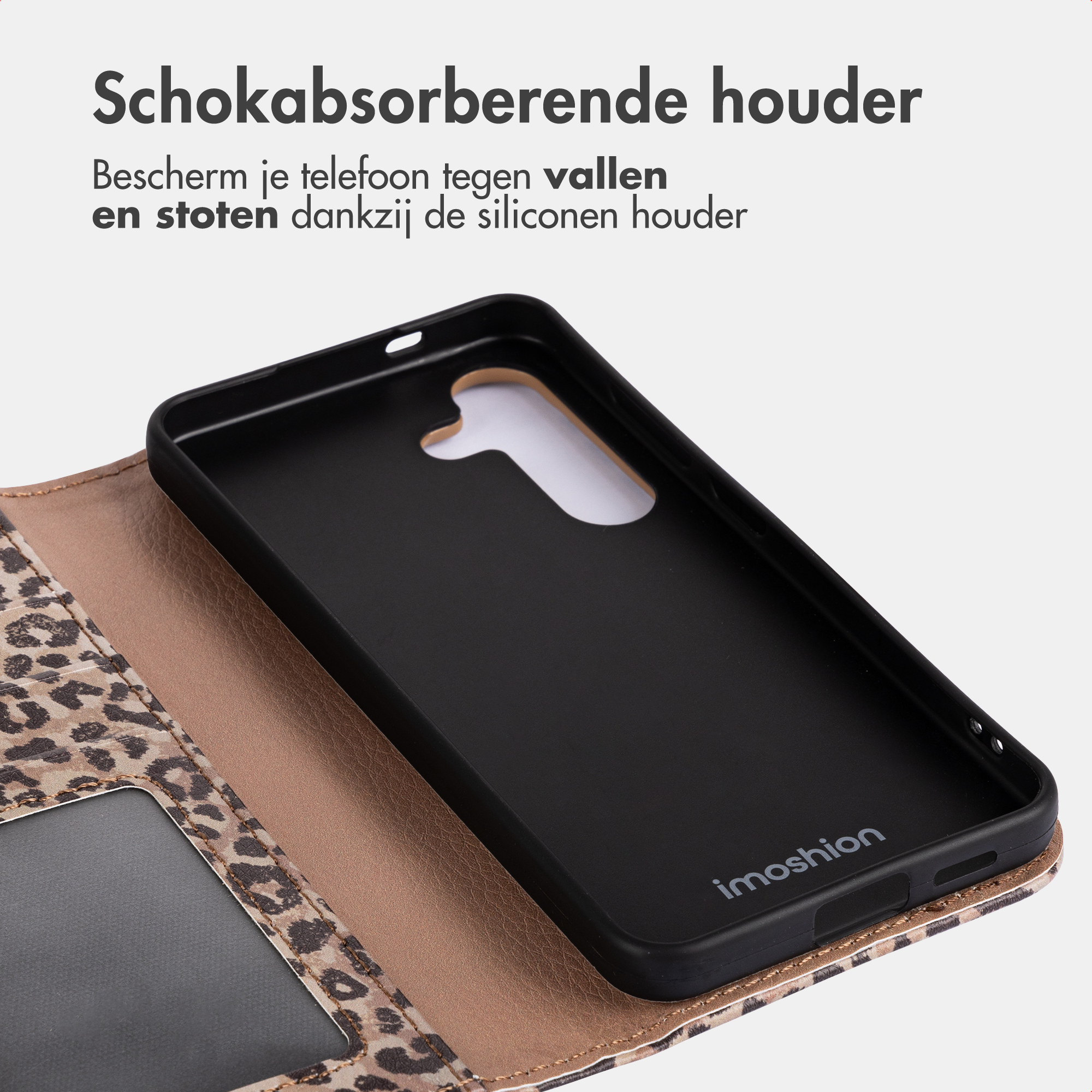 Custodia nera per telefono con stampa leopardata e fodera oro rosa.