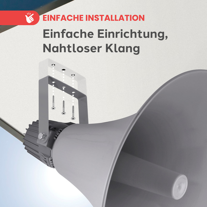 Grauer Lautsprecher mit Montagehalterung und Schrauben an einer Decke.