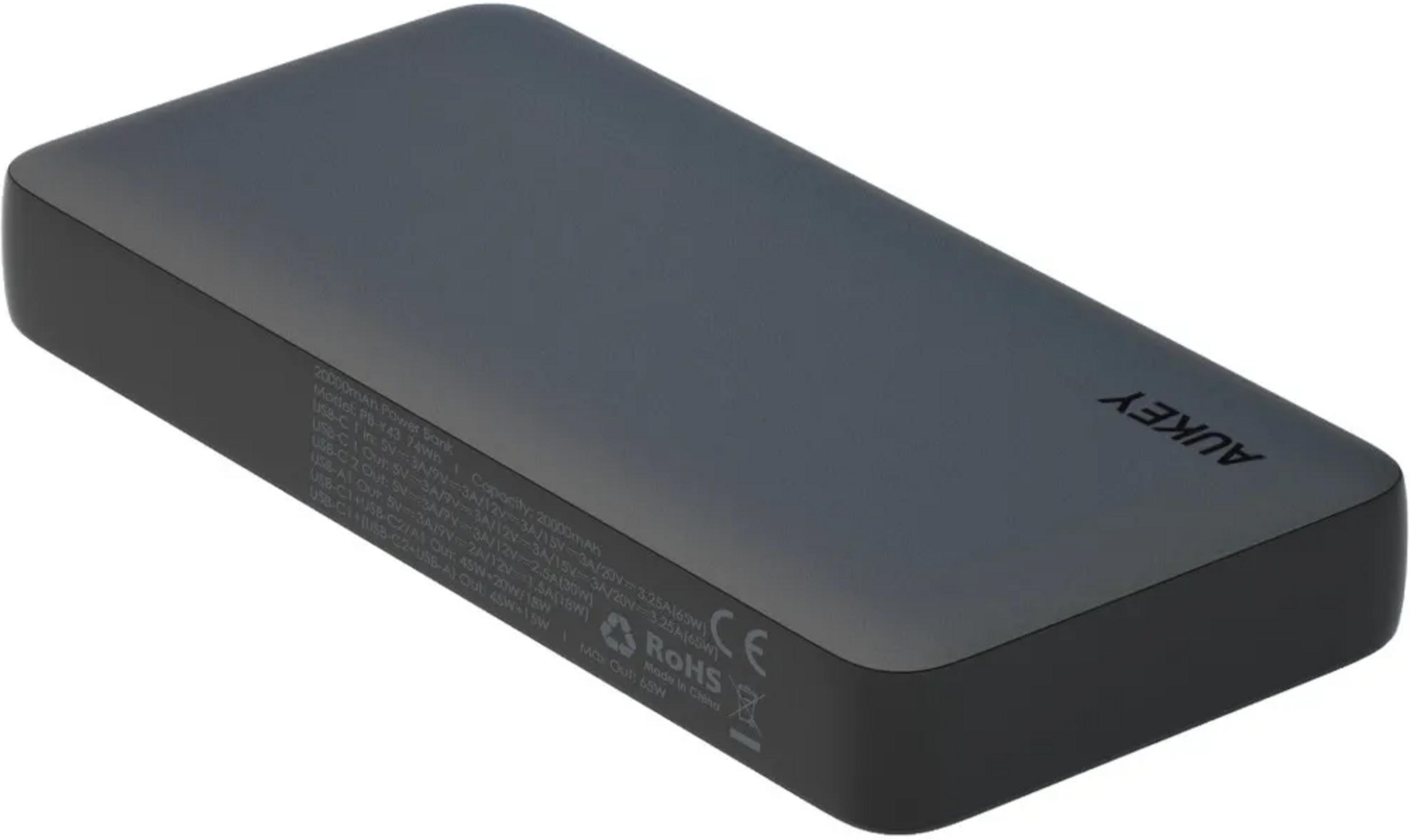 Power bank AUKEY grigio scuro da 20000mAh con più porte USB e marcature.