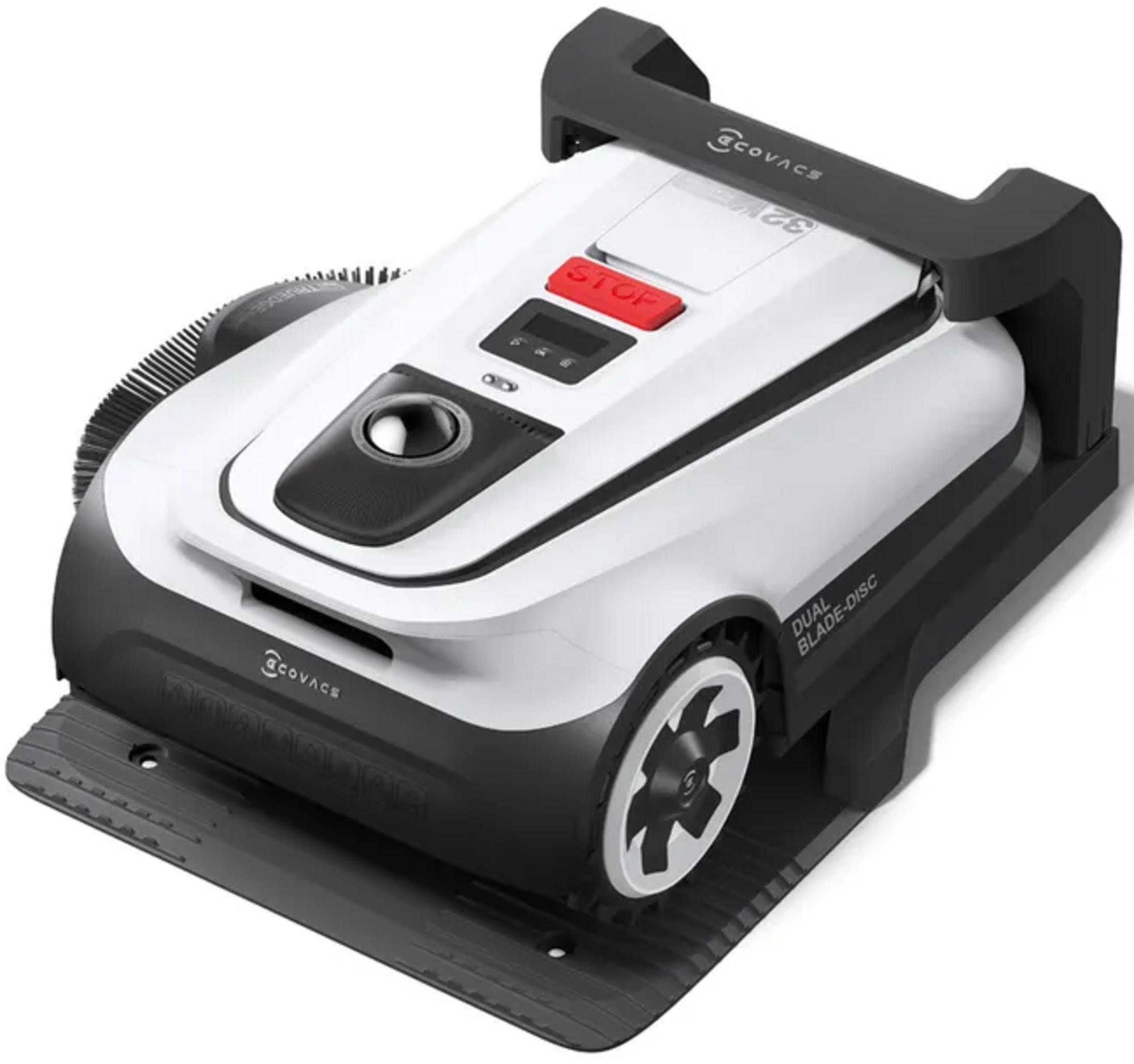 Ein weißer und schwarzer Mähroboter mit rotem Stoppknopf und Rädern.