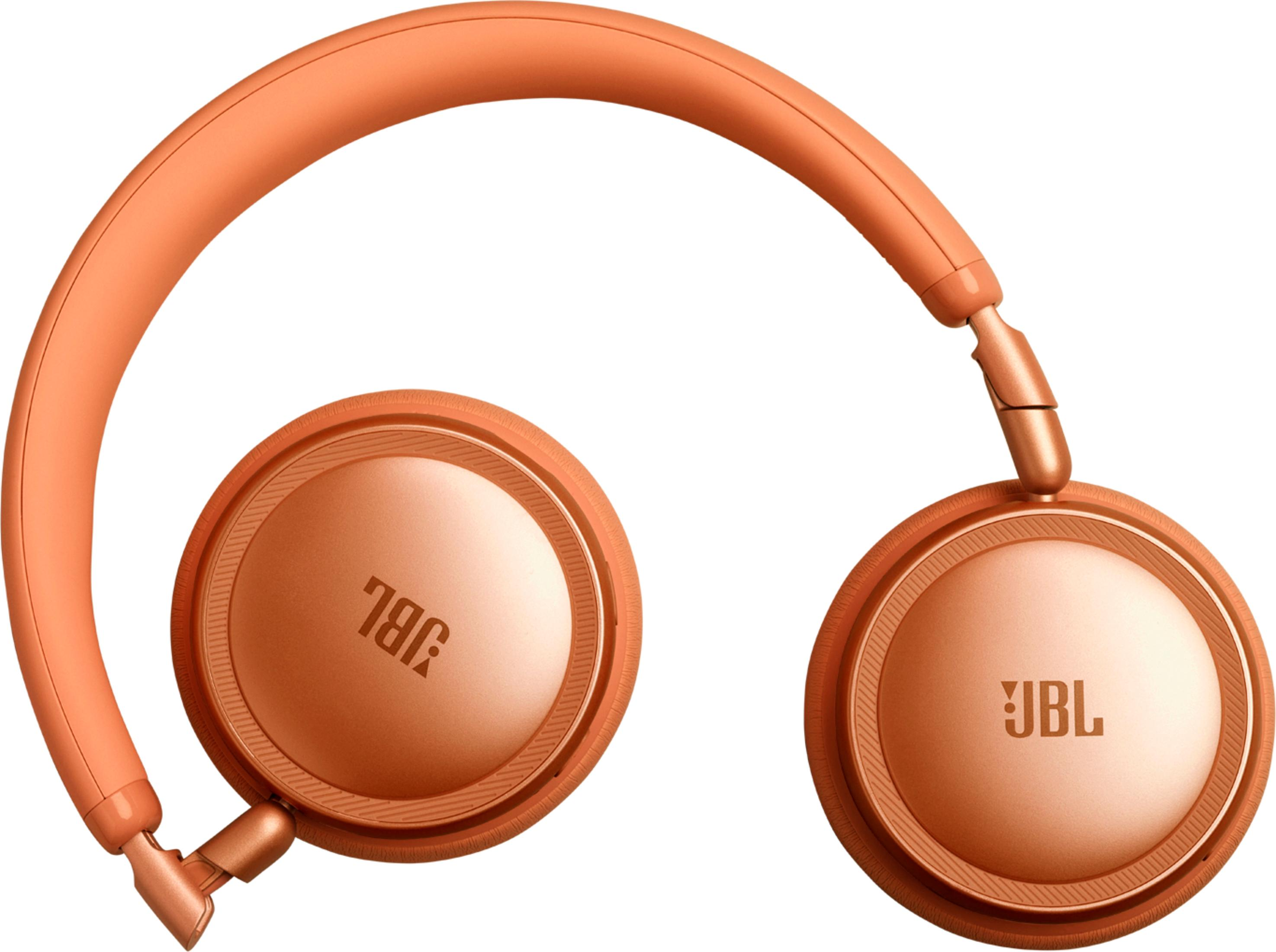 Cuffie JBL arancioni con archetto e padiglioni rotondi.
