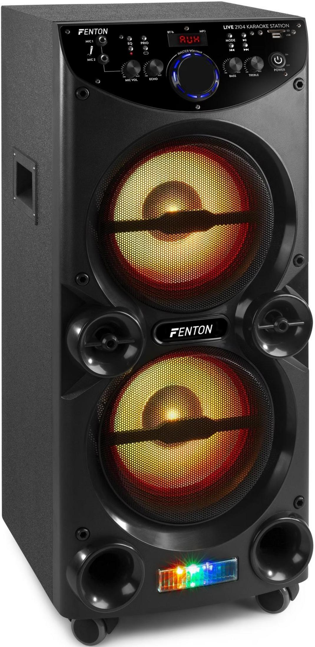 Un altavoz de karaoke Fenton negro con luces y controles.