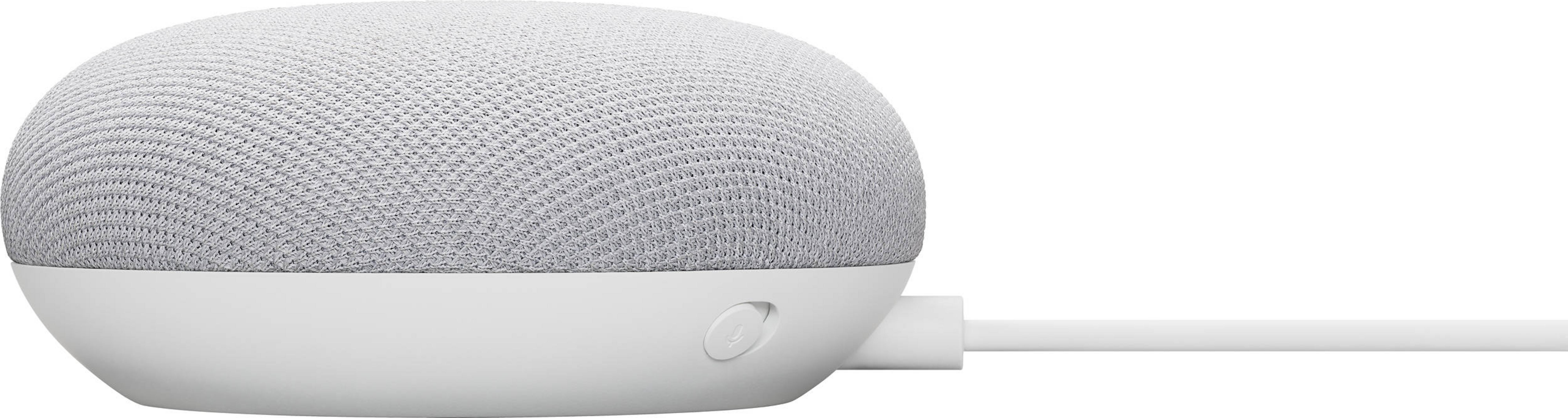 Un altavoz inteligente Google Nest Mini blanco con parte superior de tela gris y cable.