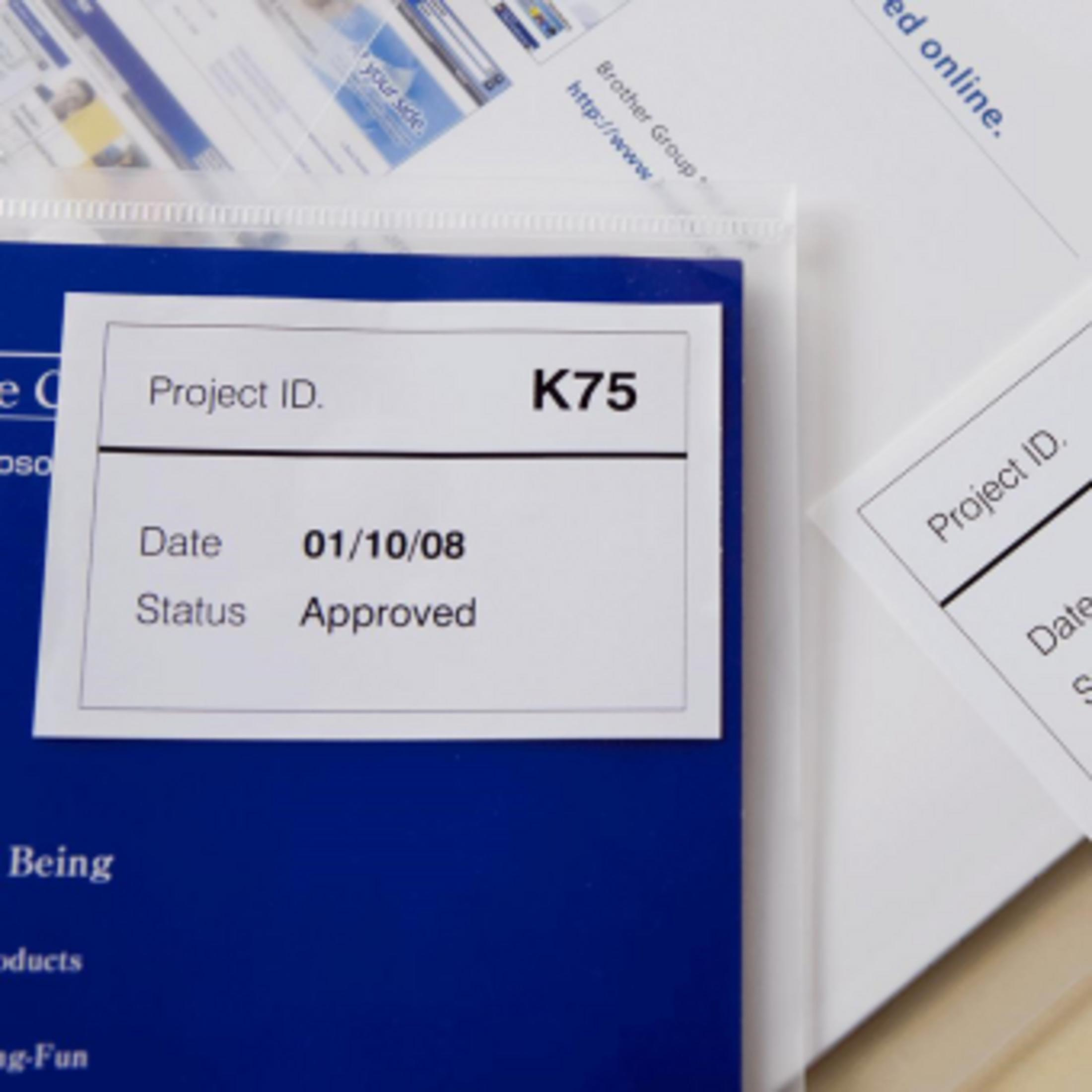 Projekt-ID K75, Datum 01/10/08, Status genehmigt auf blauem Hintergrund.