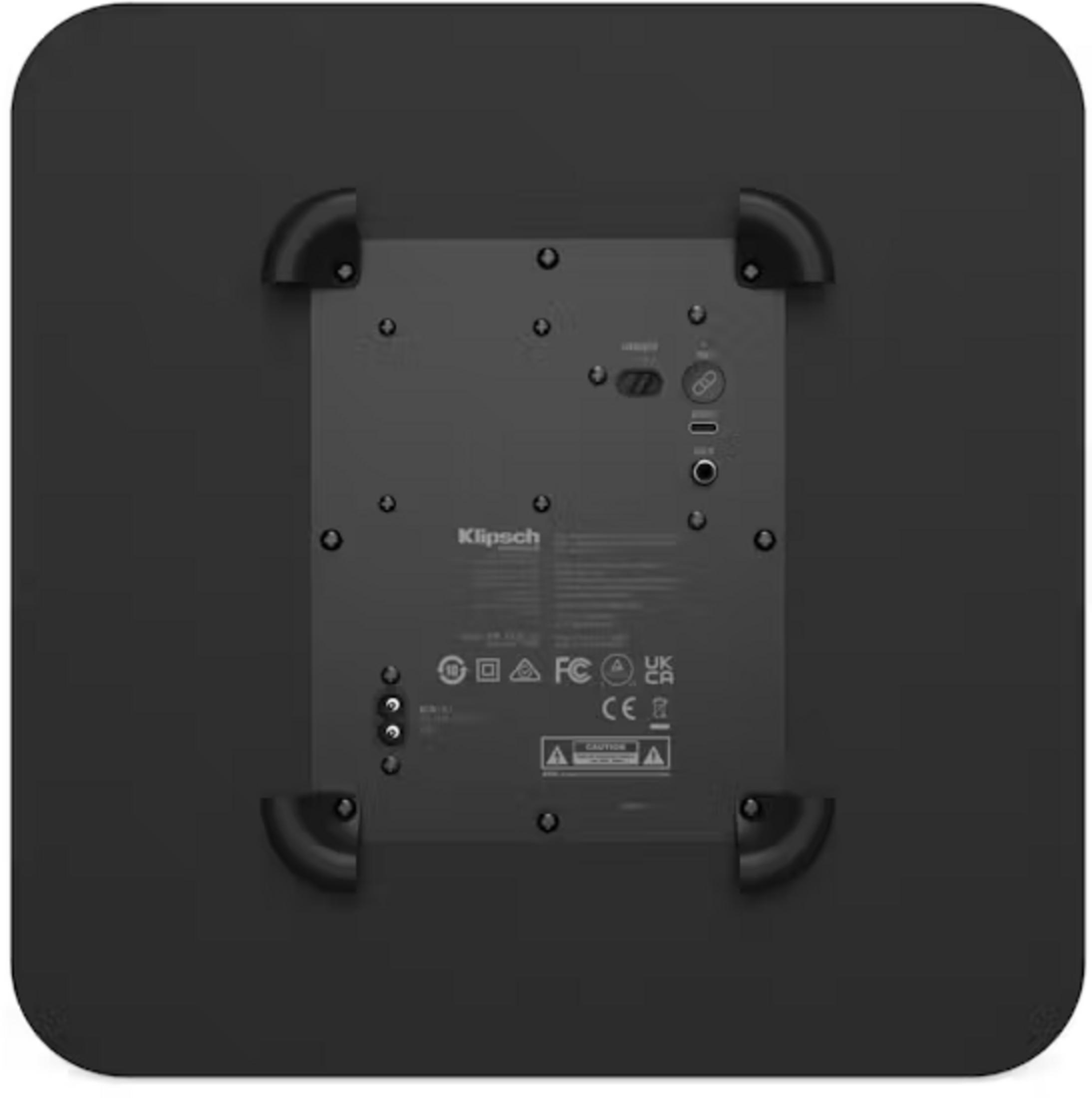 Retro di un dispositivo nero con porte, interruttori ed etichette.