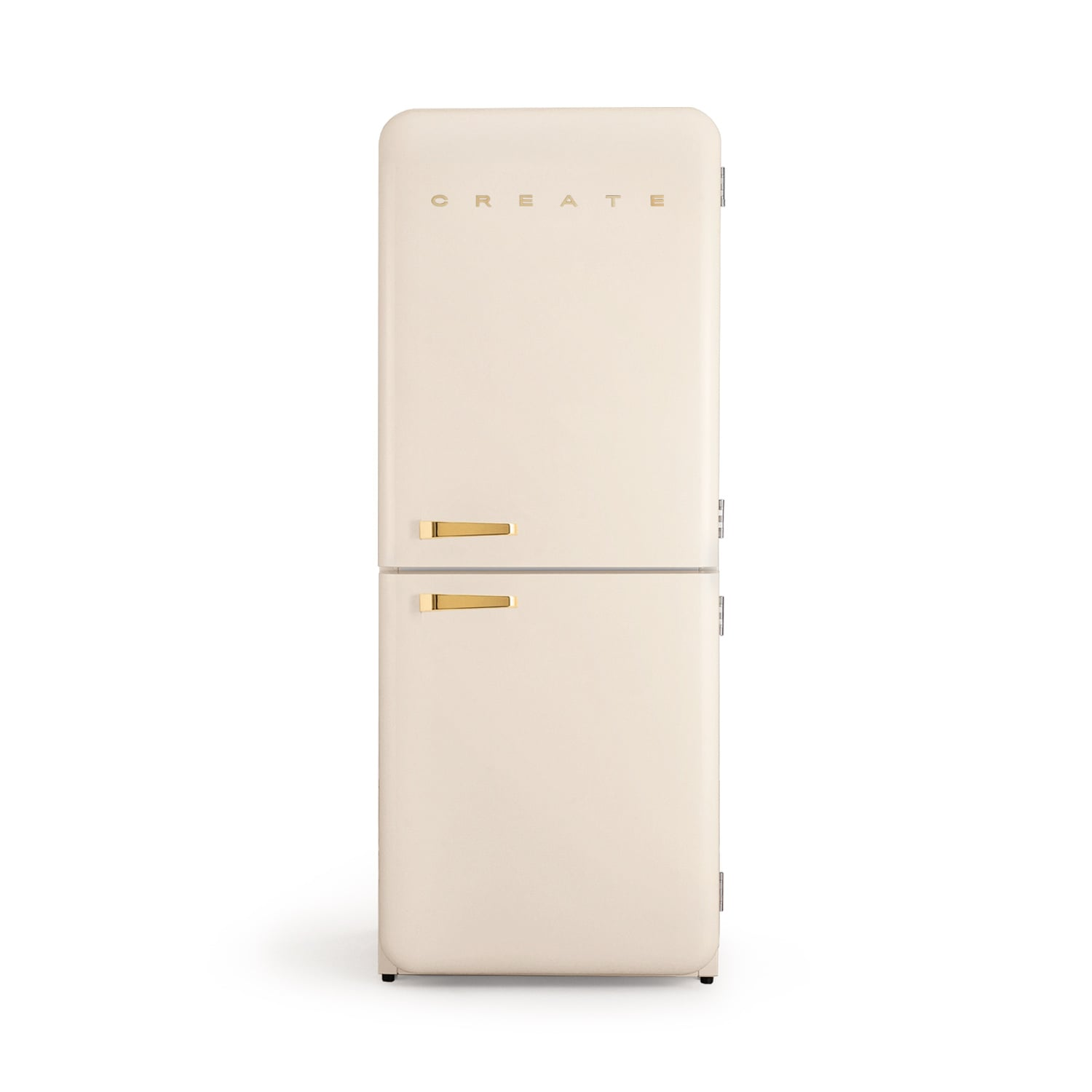 Un refrigerador color crema con tiradores dorados y la palabra CREATE arriba.
