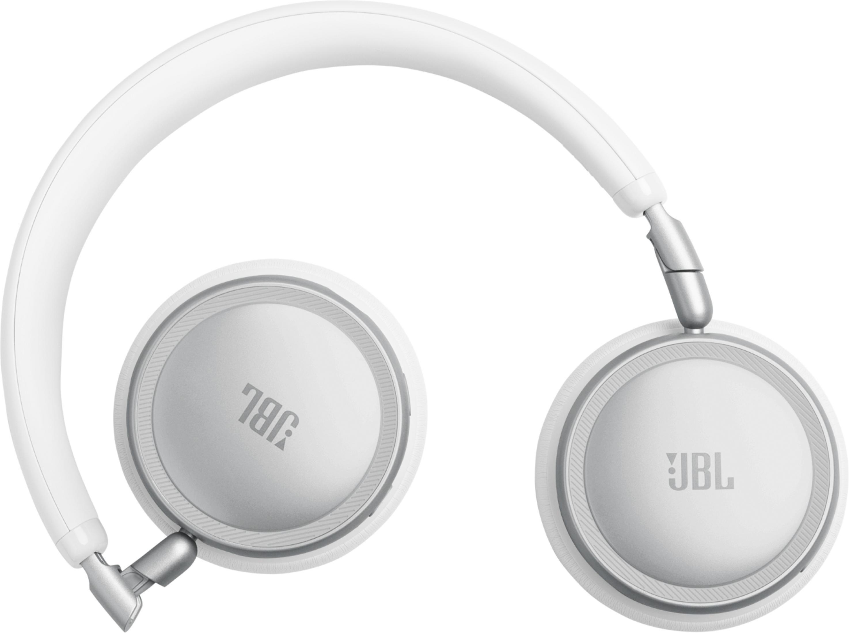 Cuffie JBL bianche con accenti argentati su sfondo bianco.