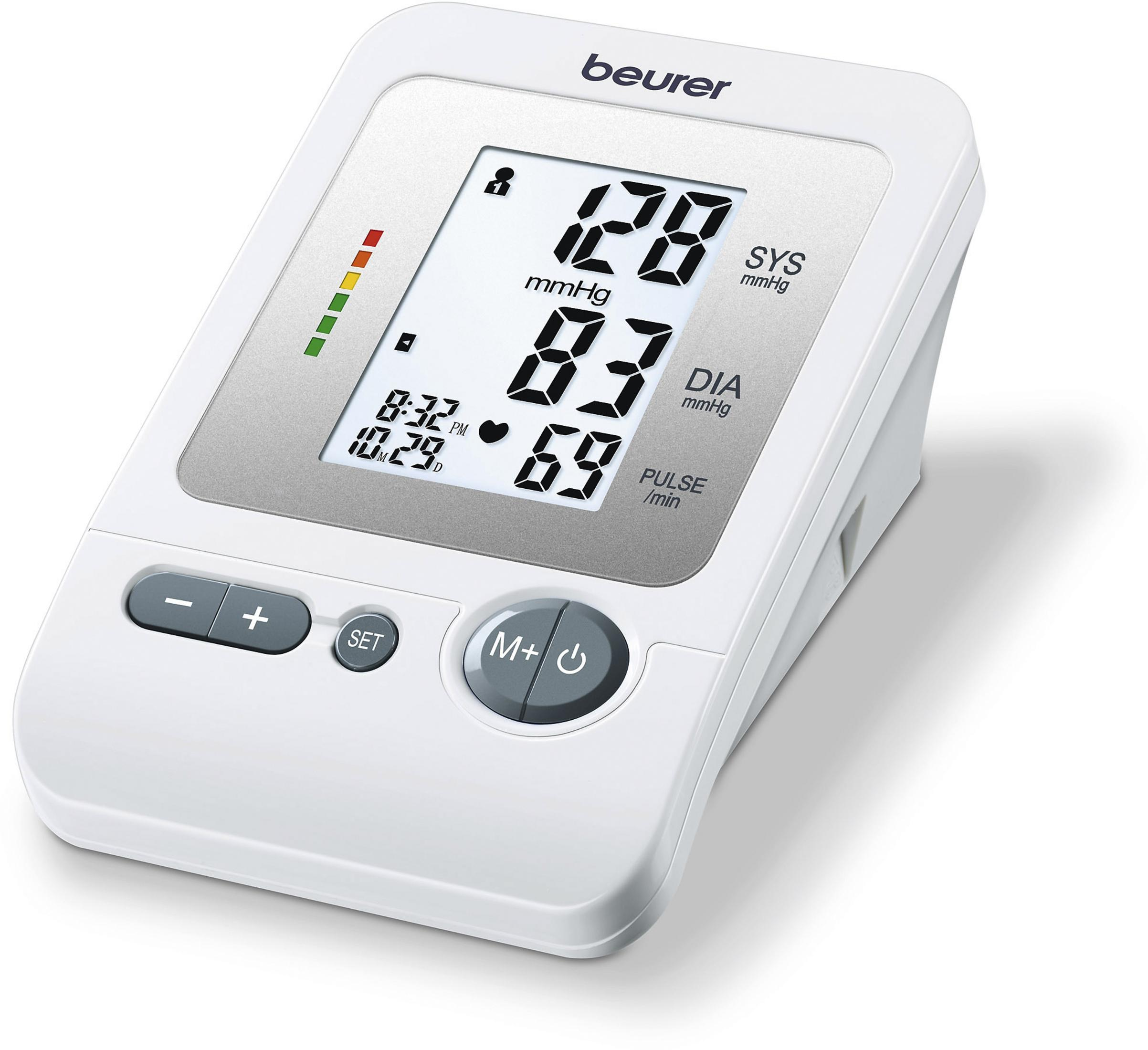 Un tensiómetro Beurer blanco con pantalla digital que muestra 128/83 mmHg y 69 lpm.
