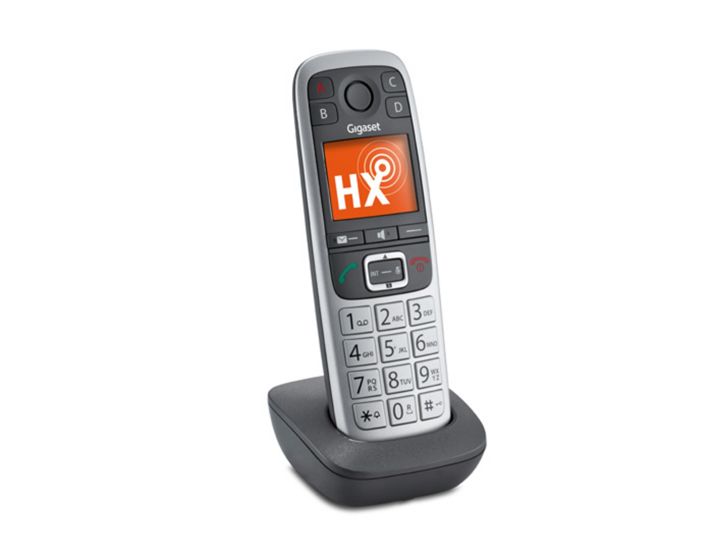 Un telefono cordless Gigaset con tastiera e schermo, appoggiato sulla base di ricarica.
