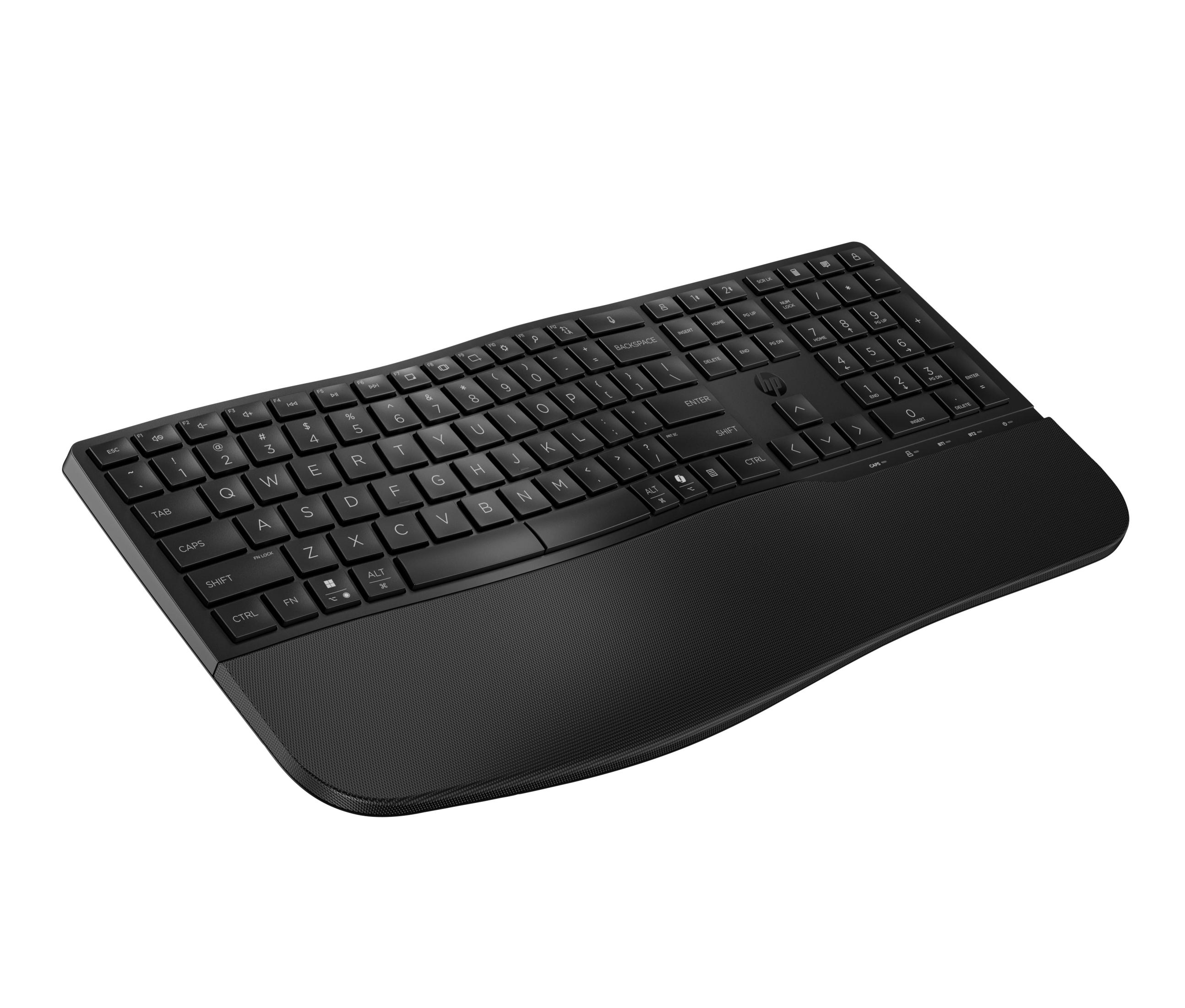 Schwarze Tastatur mit Handballenauflage, von rechts vorne gesehen.